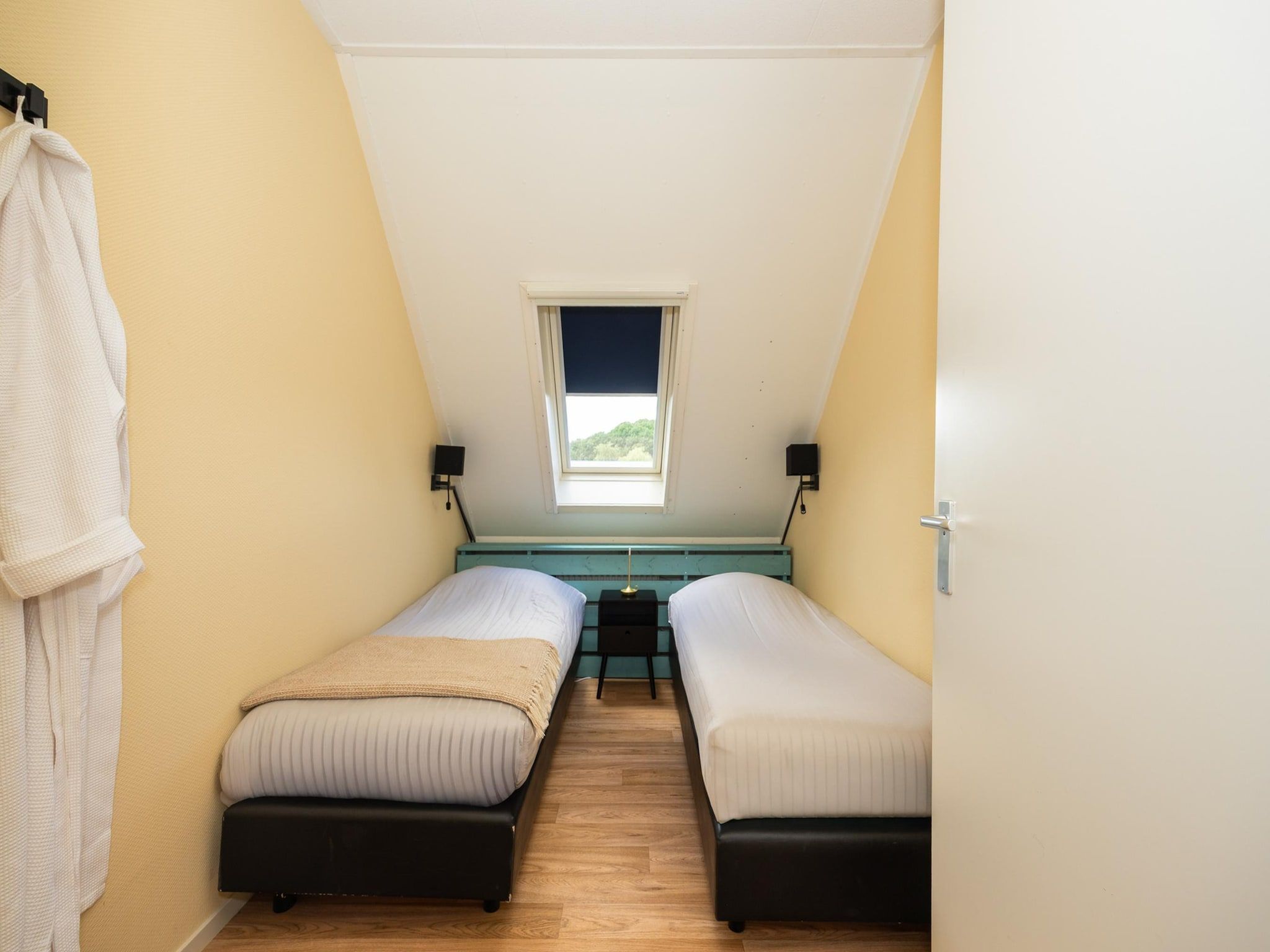 Een slaapkamer van Andijk 15 in Andijk