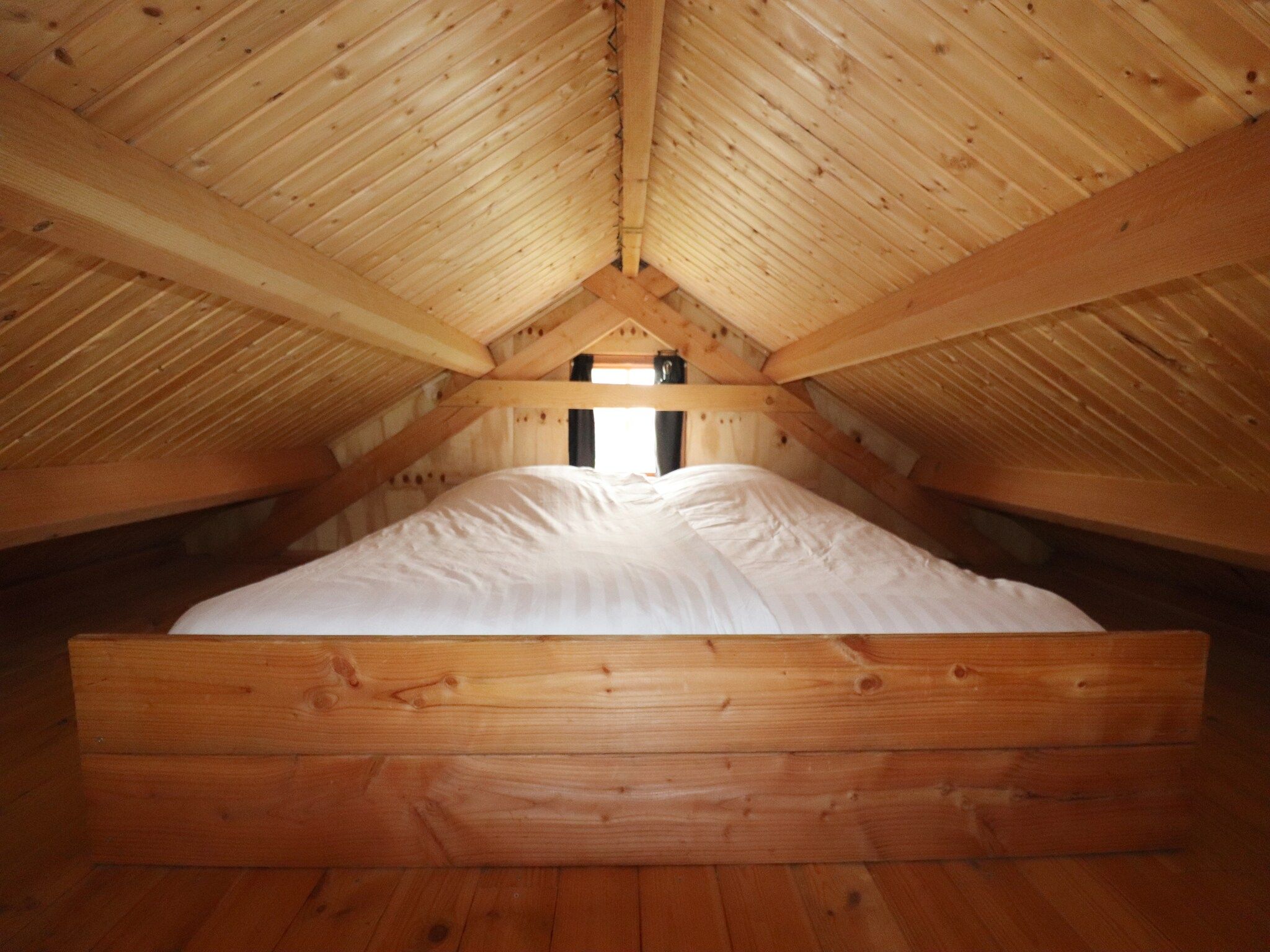 Een slaapkamer van Grutto in Tjerkgaast