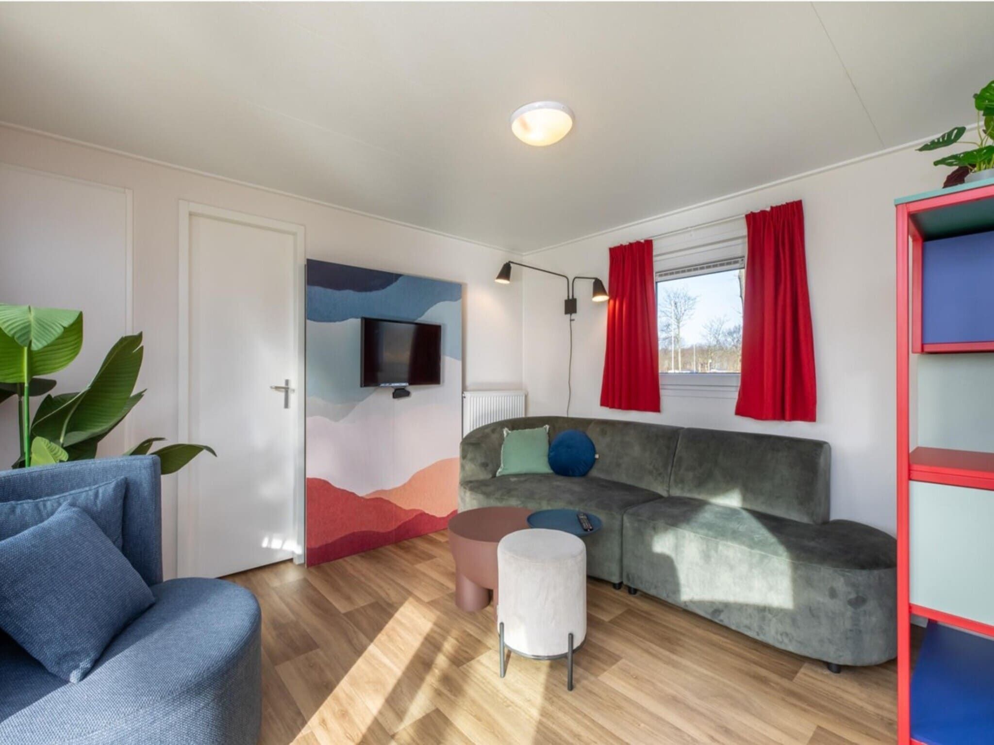 De woonkamer van Chalet - Camping de Duinhoeve 'Bosdier' in Burgh-Haamstede