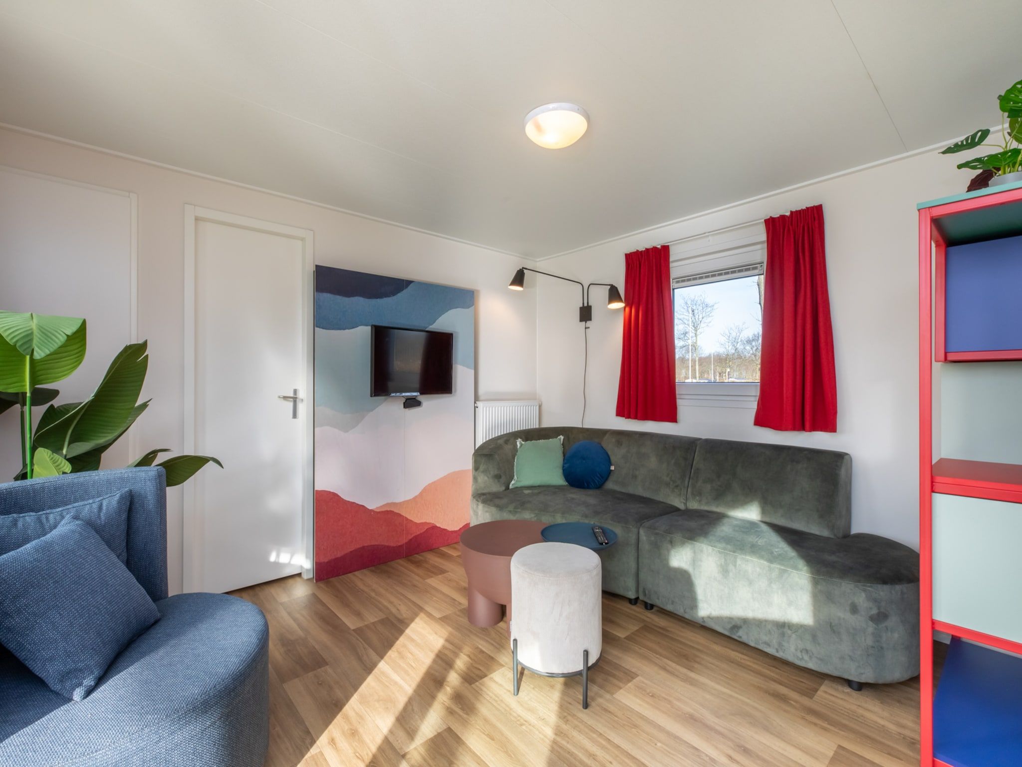 De woonkamer van Chalet - Camping de Duinhoeve 'Bosdier' in Burgh-Haamstede