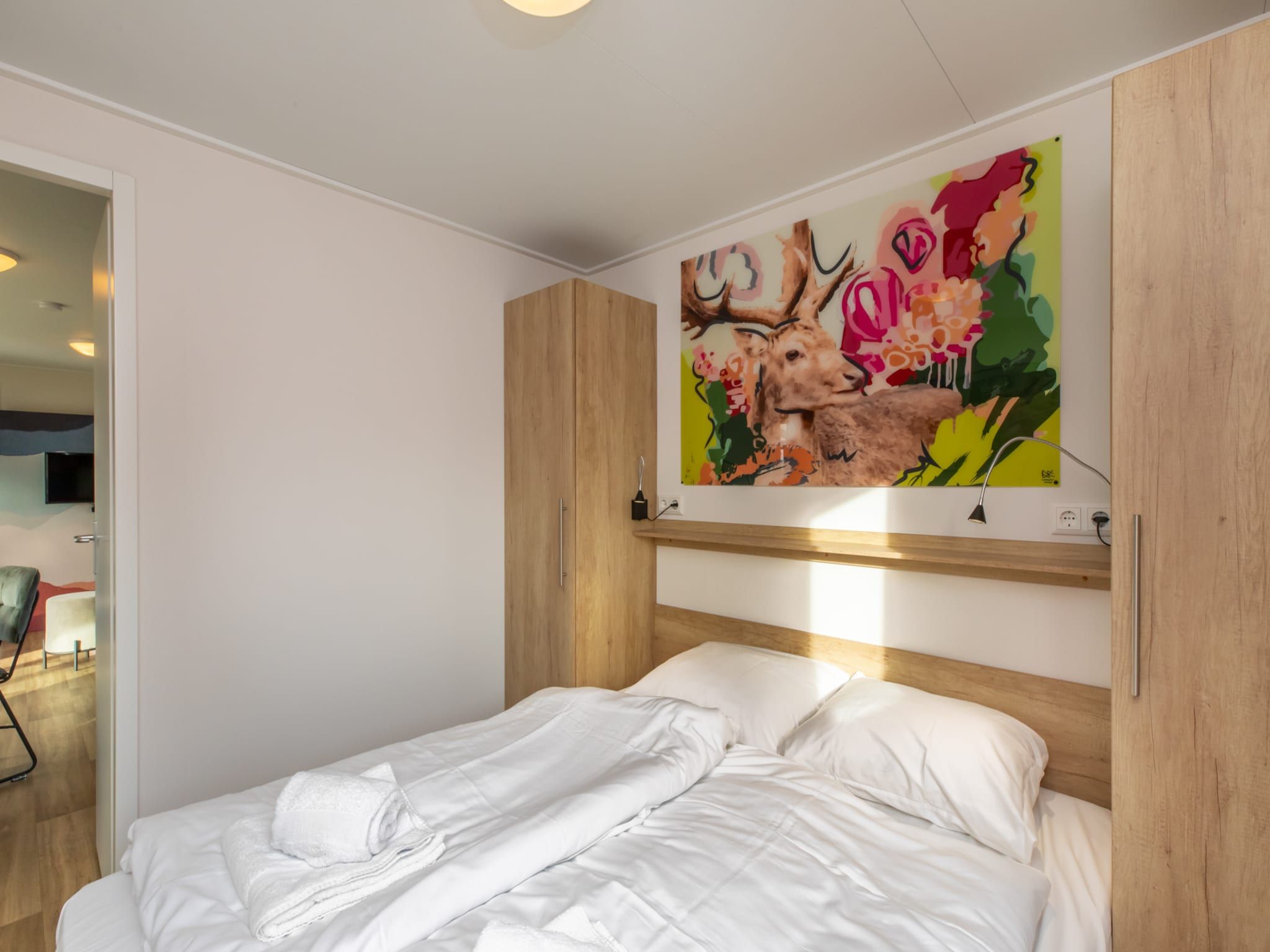 Een slaapkamer van Chalet - Camping de Duinhoeve 'Bosdier' in Burgh-Haamstede