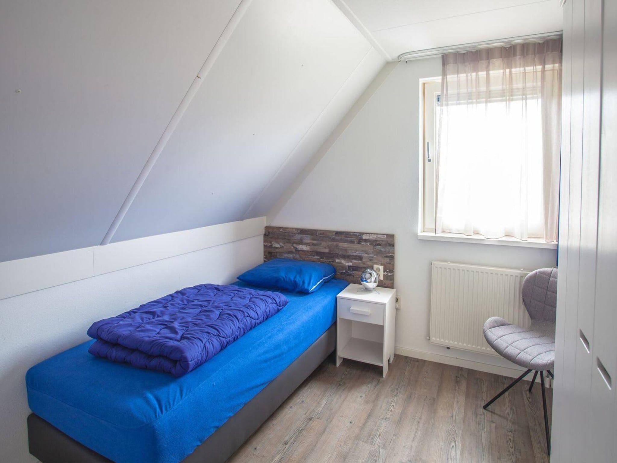 Een slaapkamer van Dijkhuis 4 in Medemblik