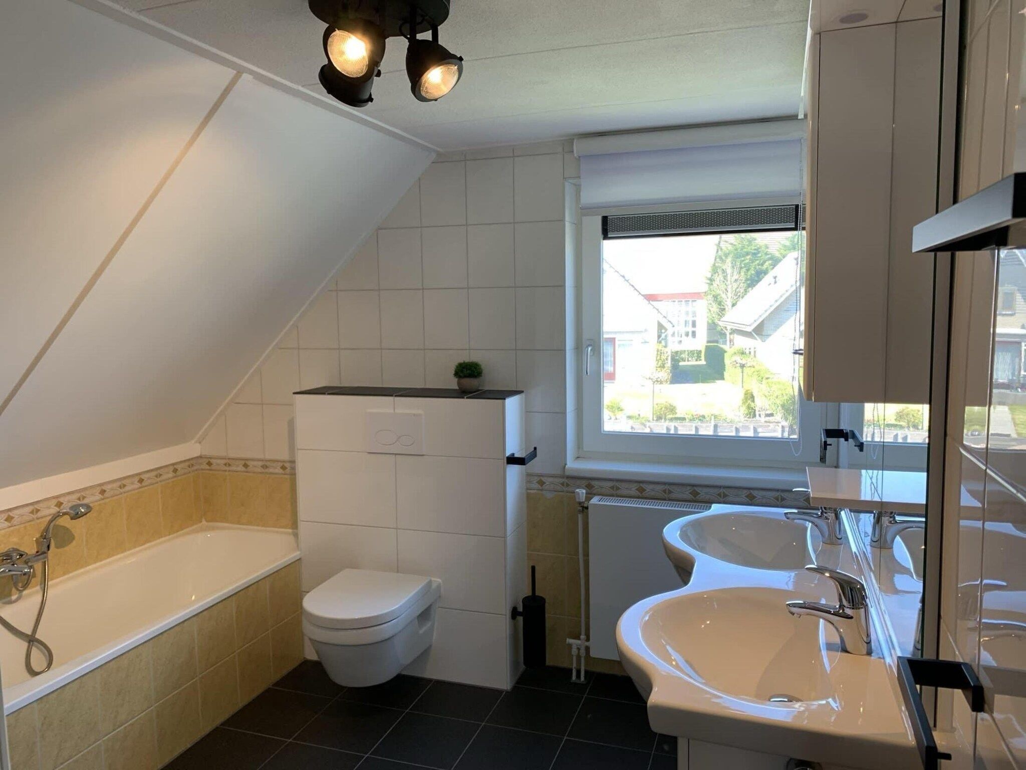De badkamer van Dijkhuis Sauna 6 in Medemblik