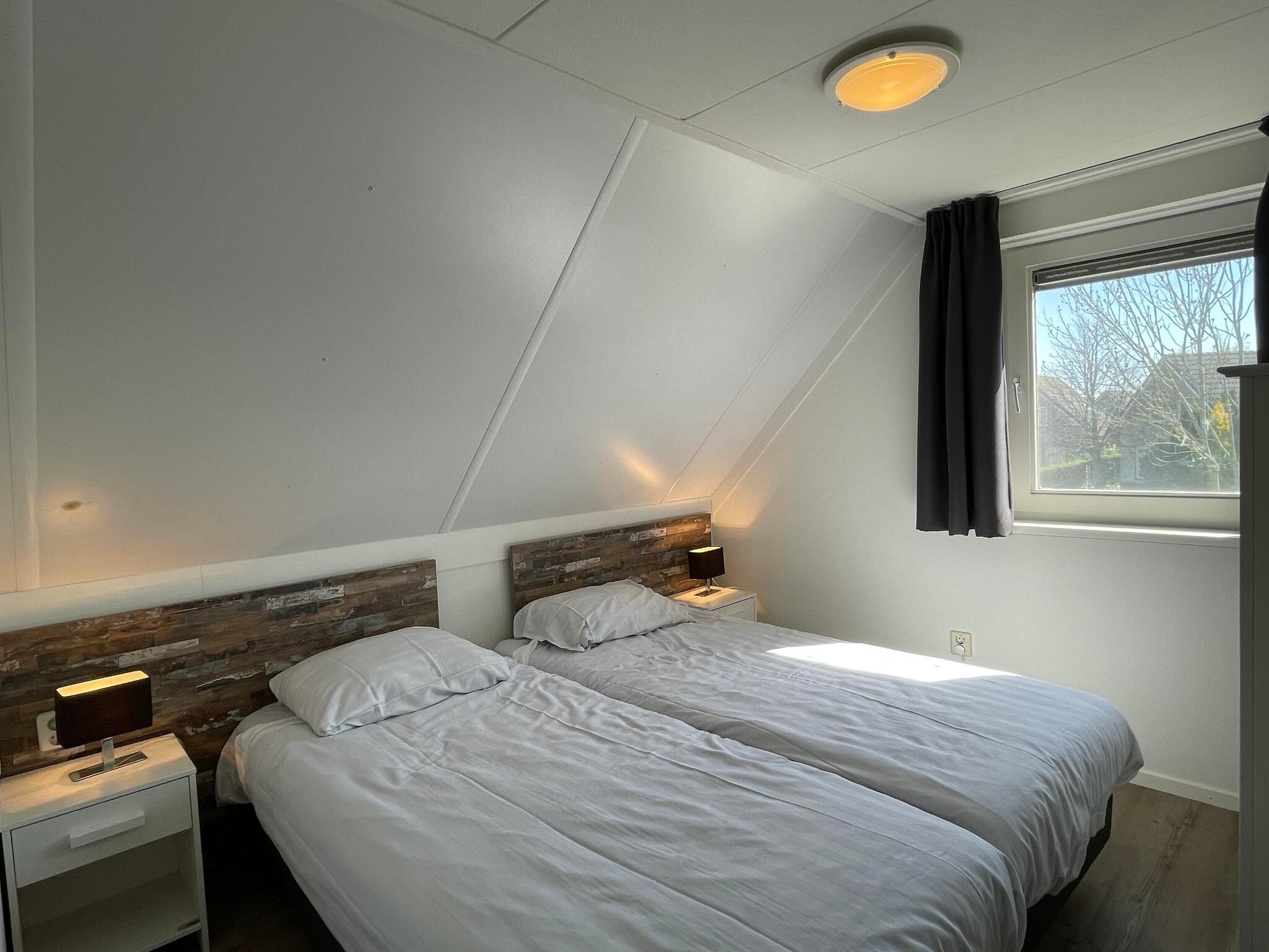 Een slaapkamer van Dijkhuis Wellness 6 in Medemblik