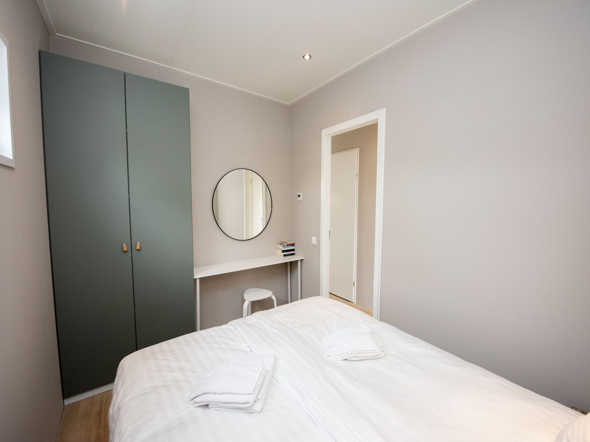 Een slaapkamer van RiggelBrug Sneekermeer in Offingawier