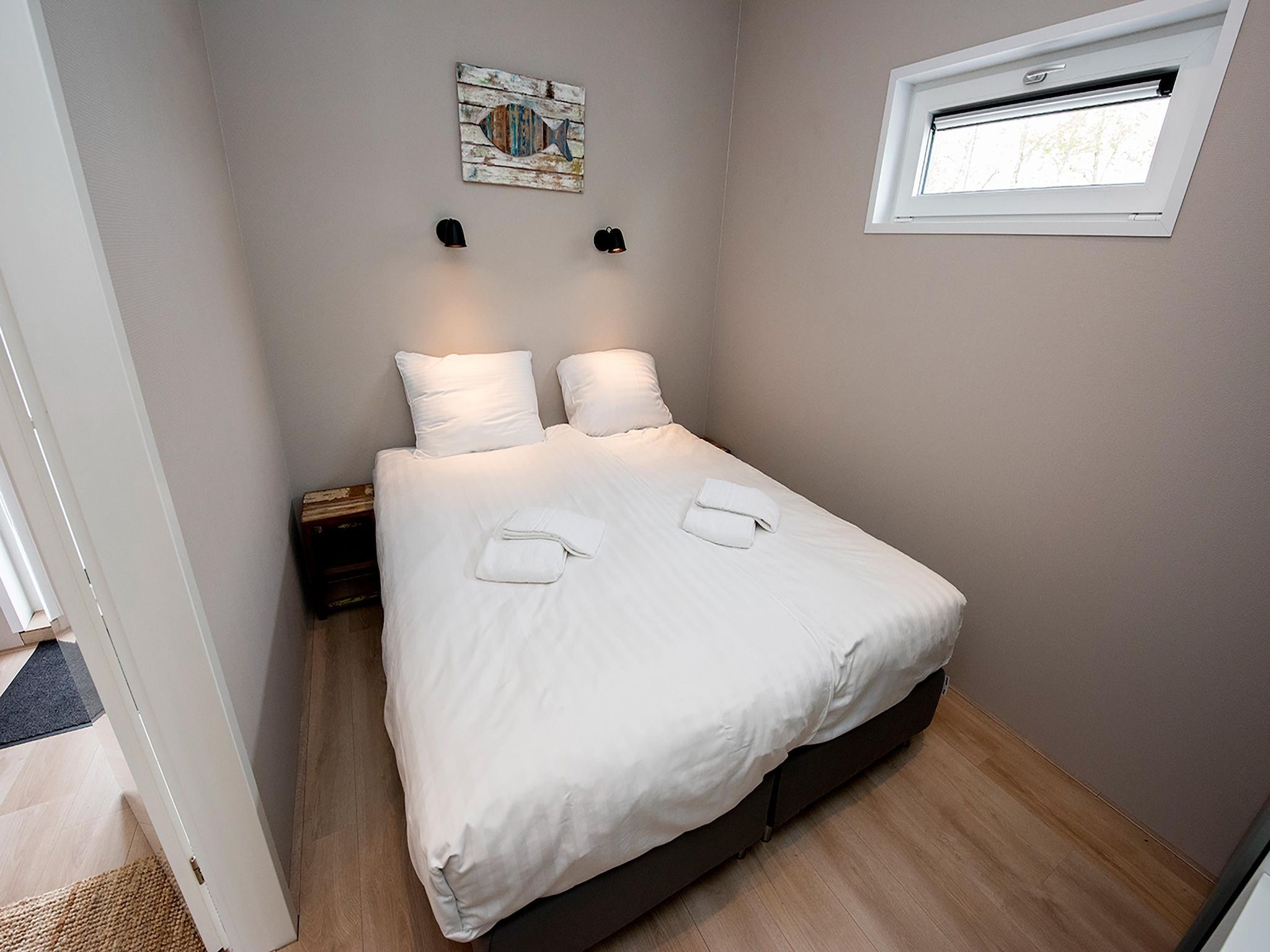 Een slaapkamer van RiggelBrug Sneekermeer in Offingawier