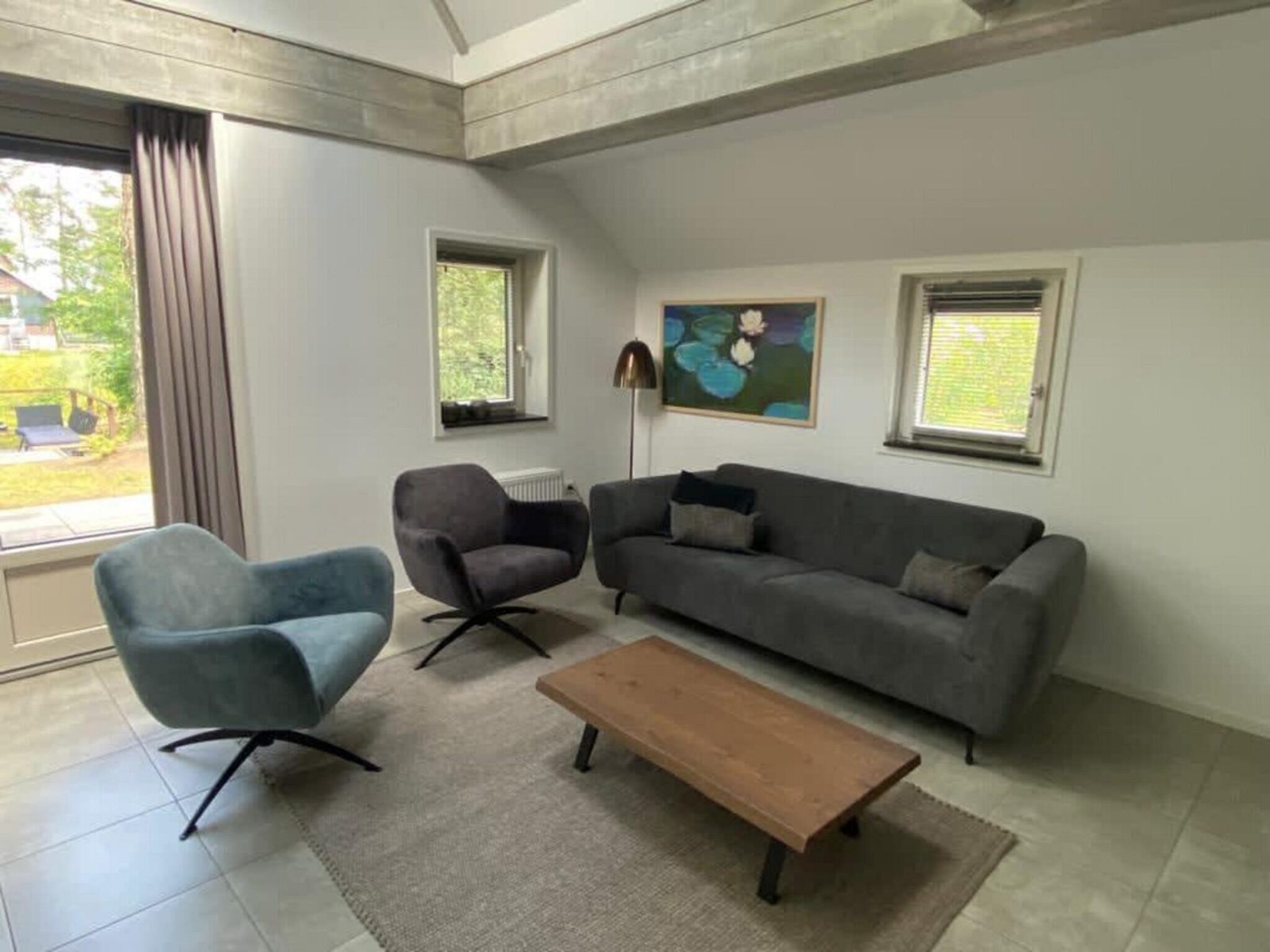 De woonkamer van Villa MIVA 8 in Otterlo