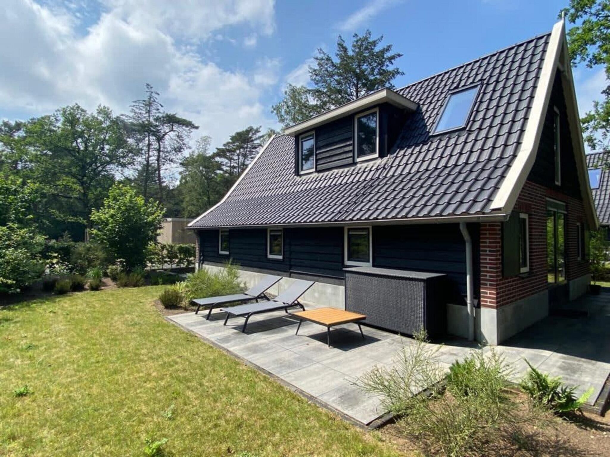 De buitenkant van Villa MIVA 8 in Otterlo