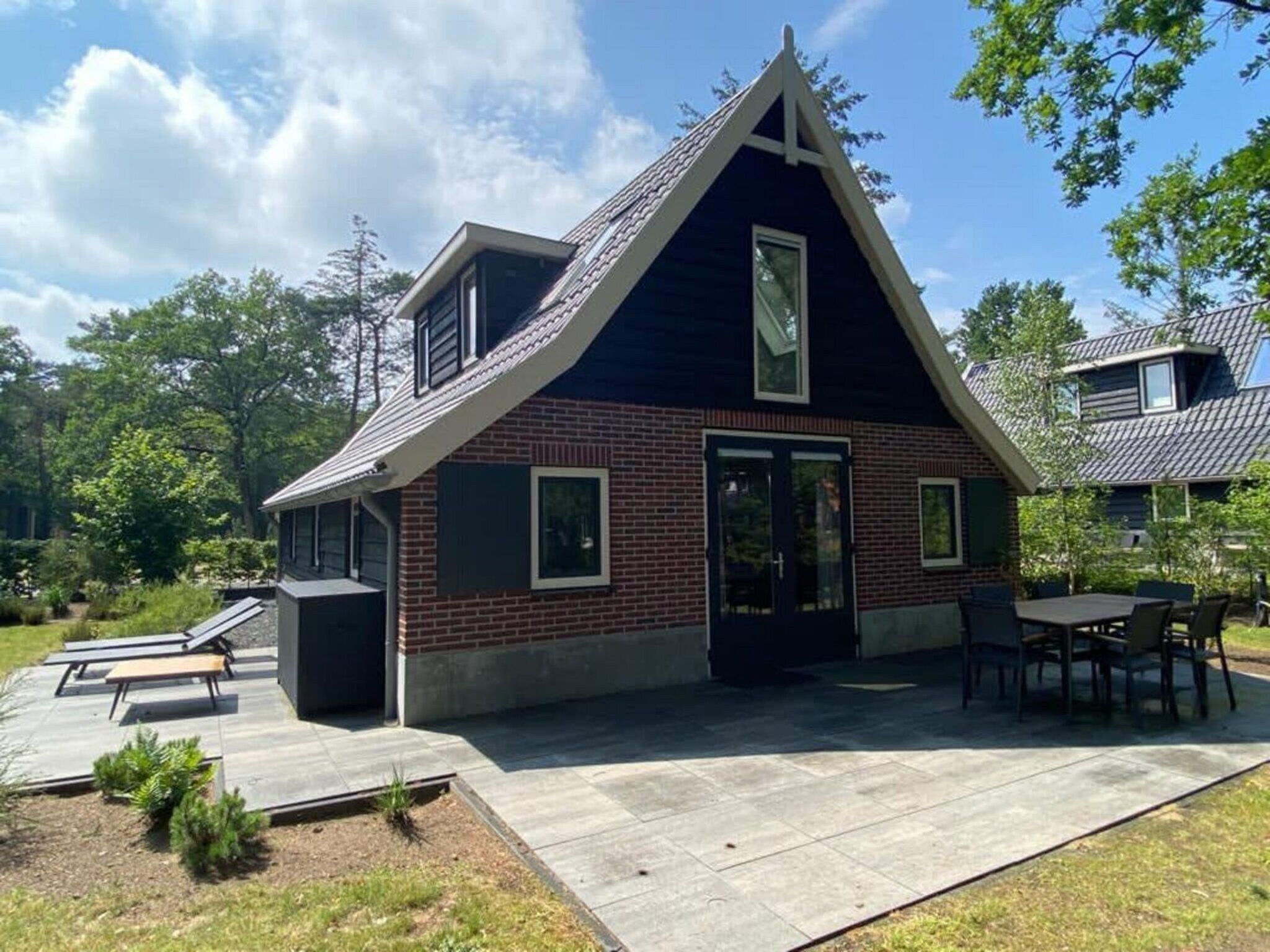 De buitenkant van Villa MIVA 8 in Otterlo