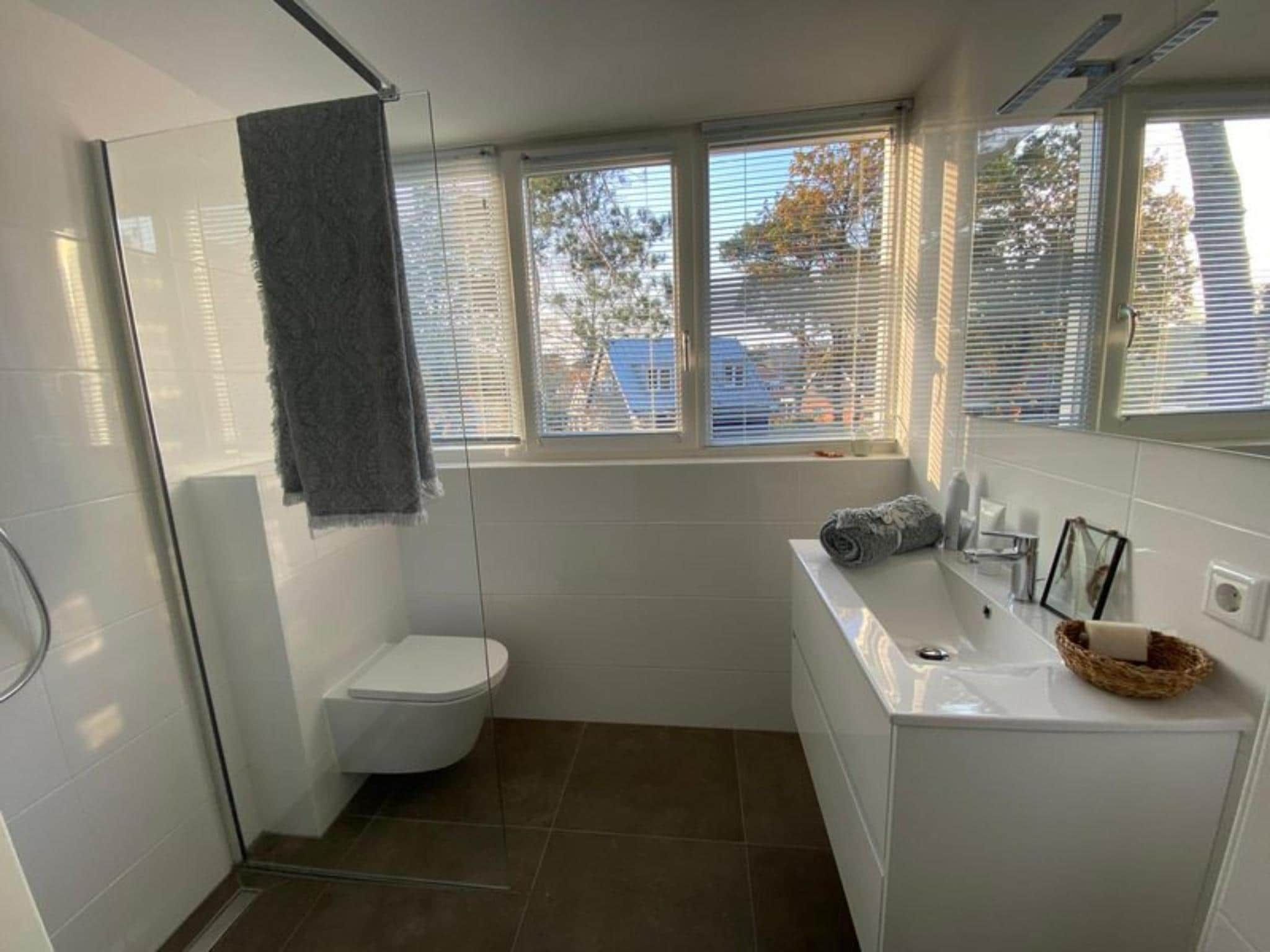 De badkamer van Strandvilla Sauna 6 in Otterlo