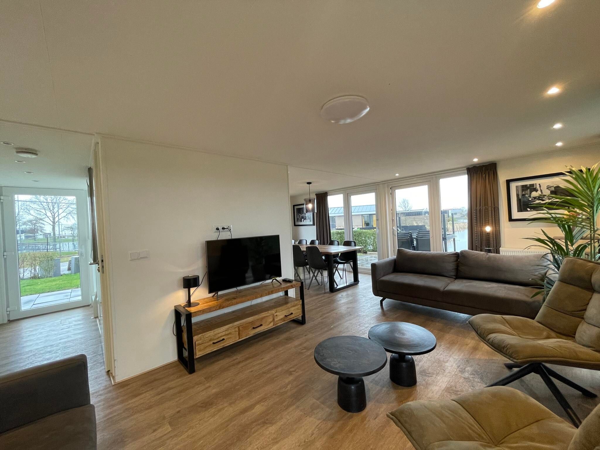 De woonkamer van Molenhof Villa  10 personen in West-Graftdijk