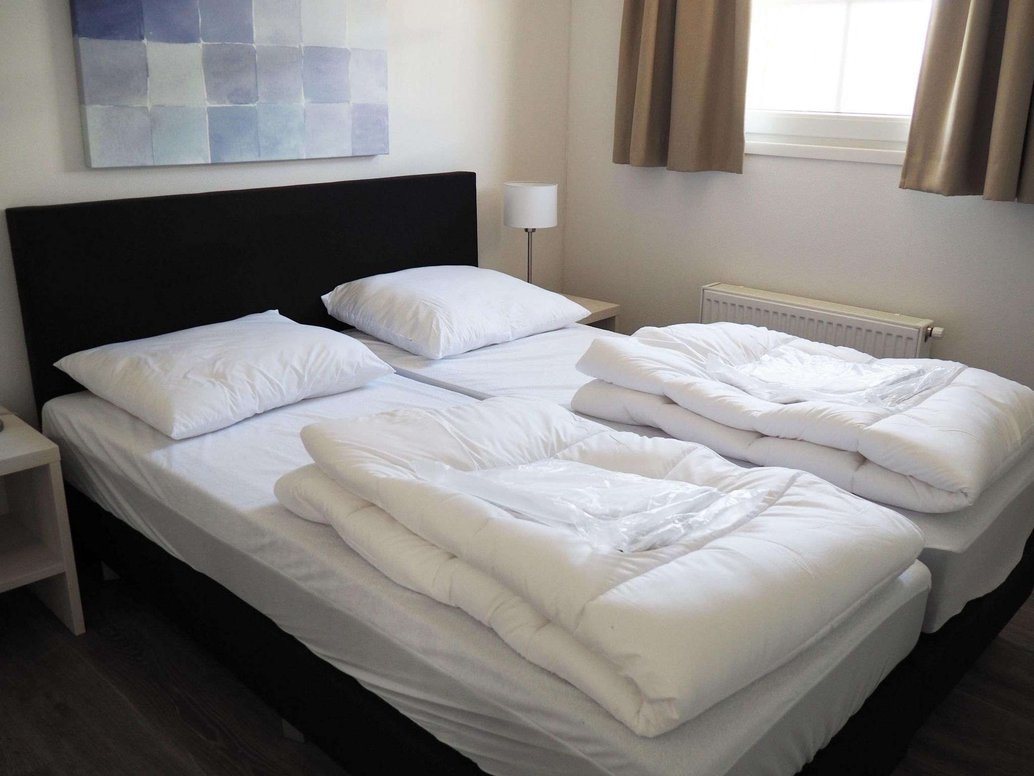 Een slaapkamer van Tulpenhof Villa  10 personen in West-Graftdijk