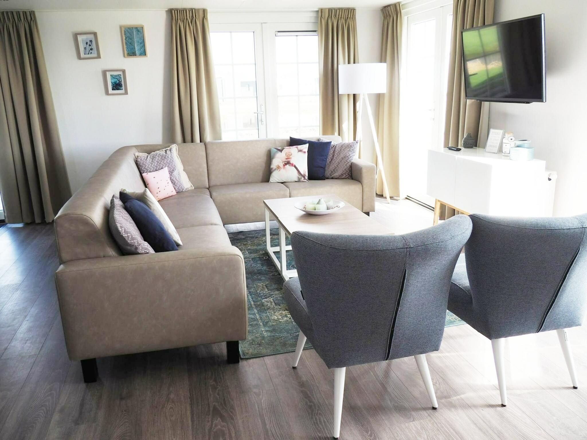 De woonkamer van Tulpenhof Villa  10 personen in West-Graftdijk