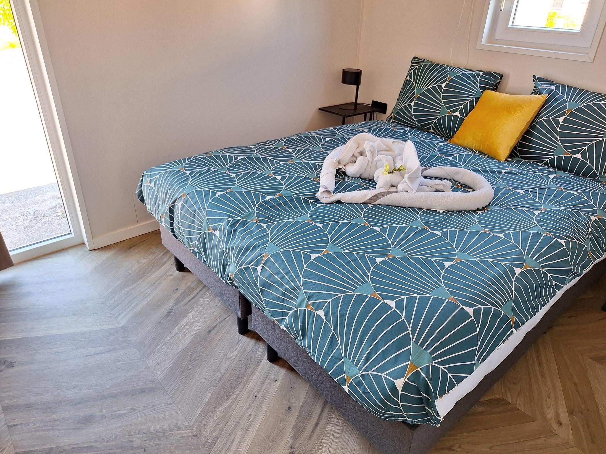 Een slaapkamer van Zaans Huisje  4 personen in West-Graftdijk