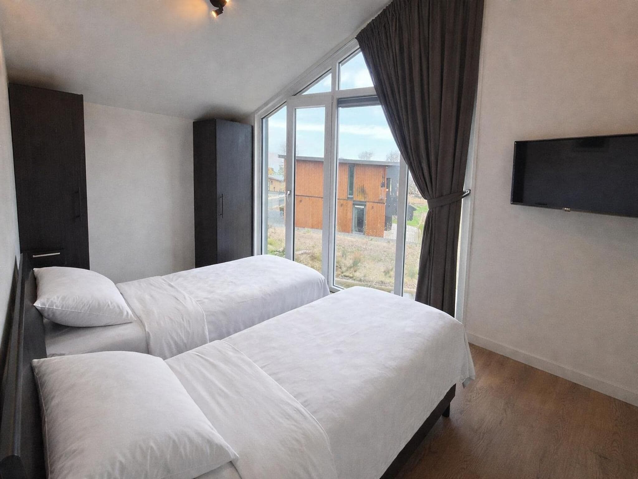 Een slaapkamer van Cube Magnifique 10 in Enkhuizen