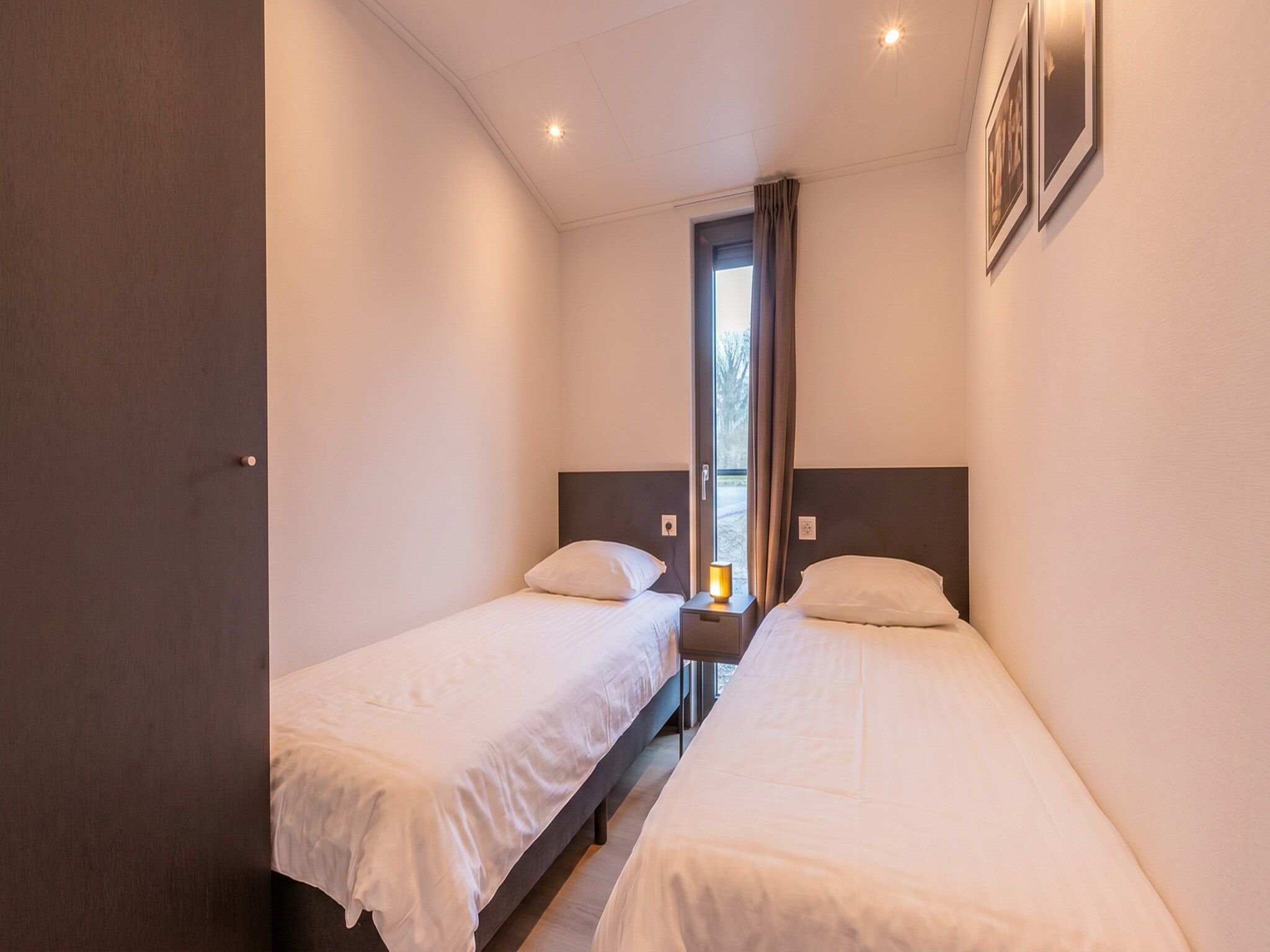 Een slaapkamer van Cube Split XL Culinair Wellness 4 in Enkhuizen