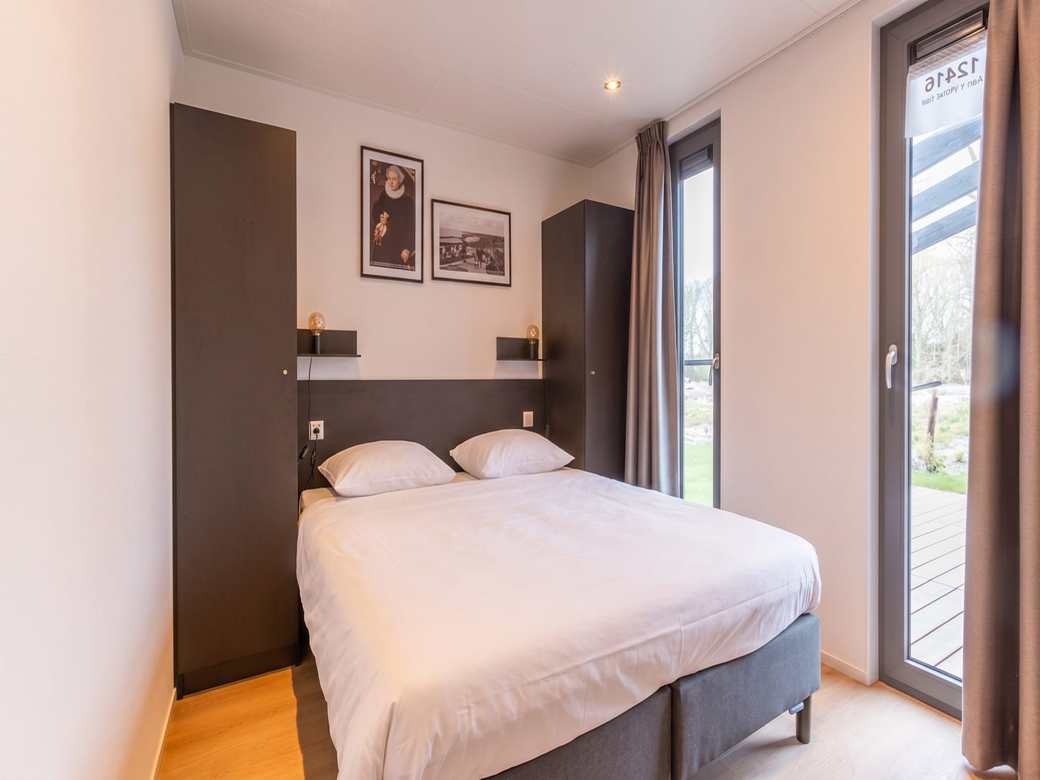 Een slaapkamer van Cube Split Culinair Wellness 6 in Enkhuizen