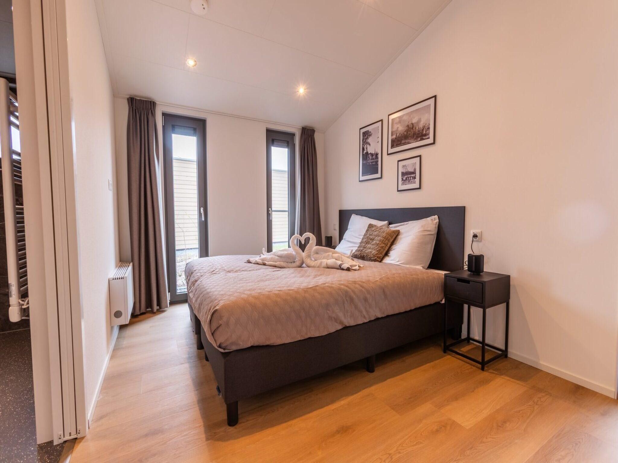 Een slaapkamer van Cube Split Sauna 4 in Enkhuizen