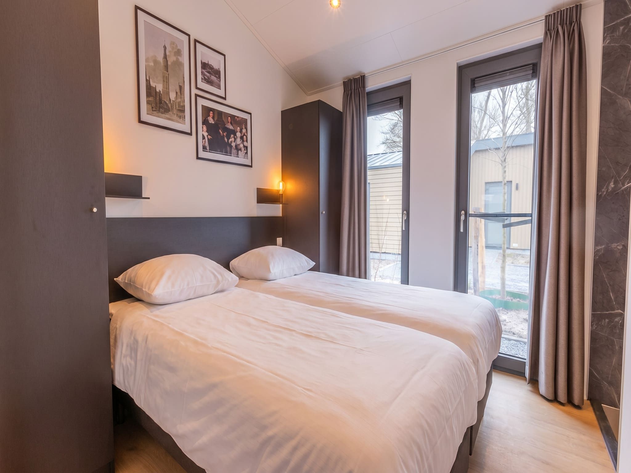 Een slaapkamer van Cube Split Culinair Sauna 4 in Enkhuizen
