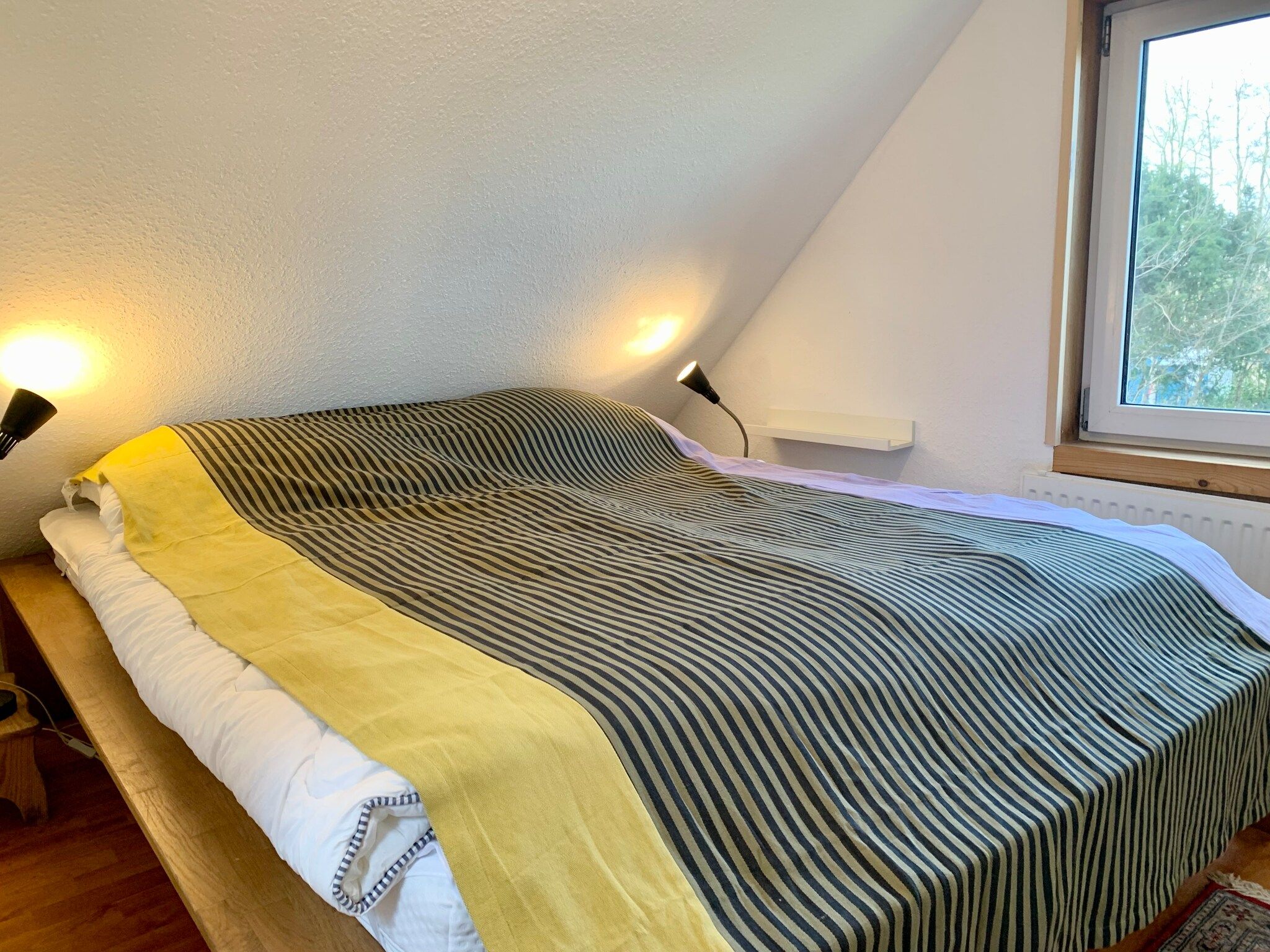 Een slaapkamer van Belkmerduinen 31 in Sint Maartenszee