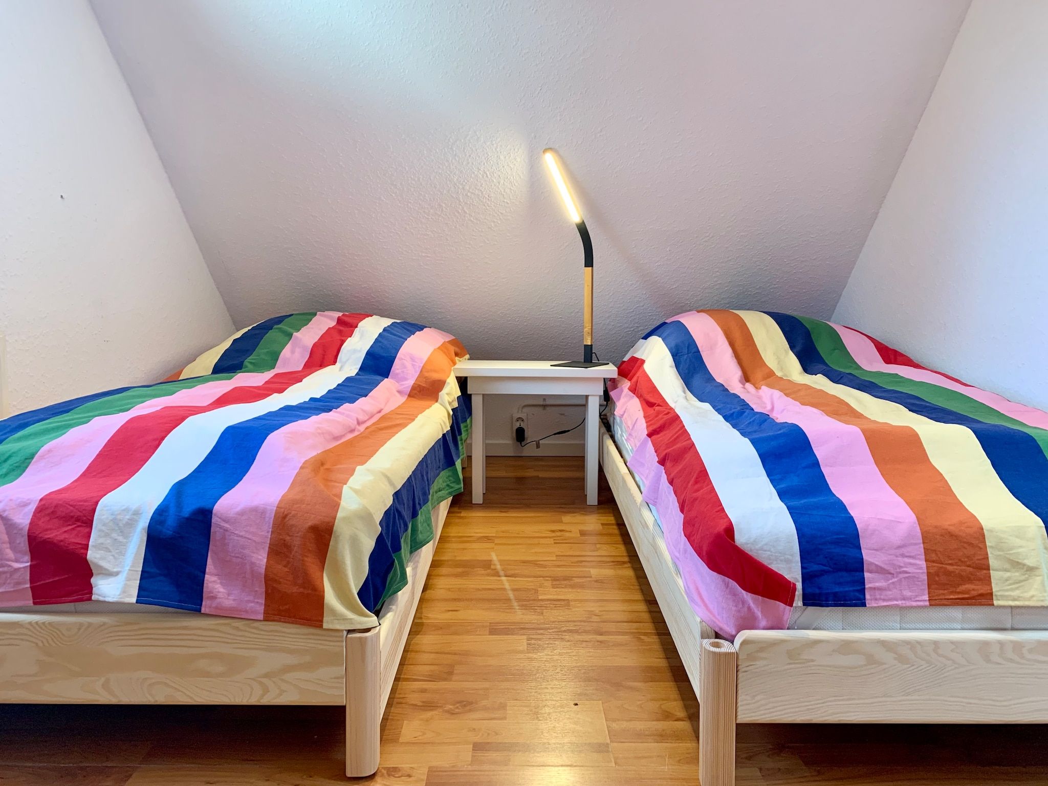 Een slaapkamer van Belkmerduinen 31 in Sint Maartenszee