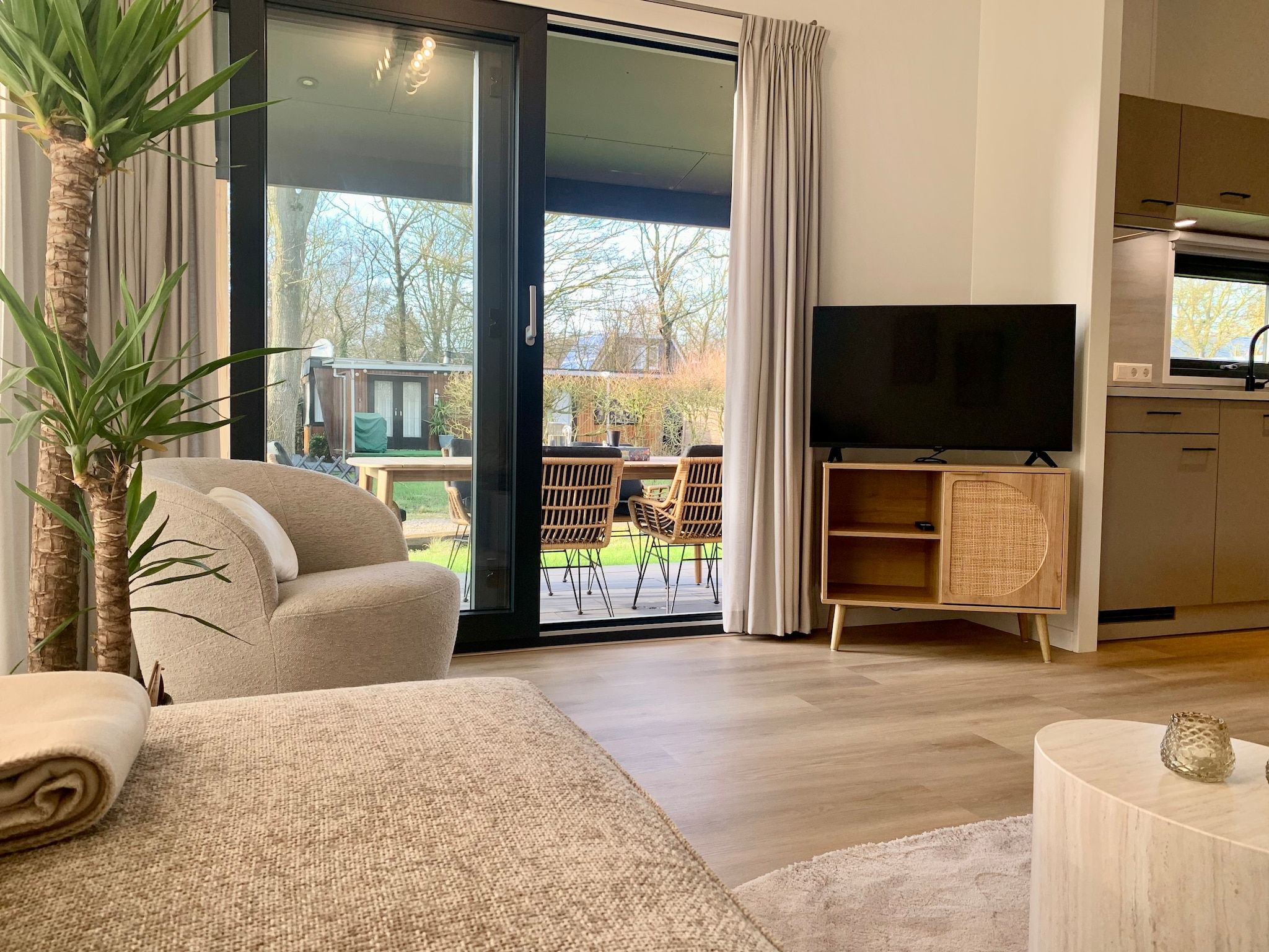 De woonkamer van Campanula 120 in Sint Maartenszee