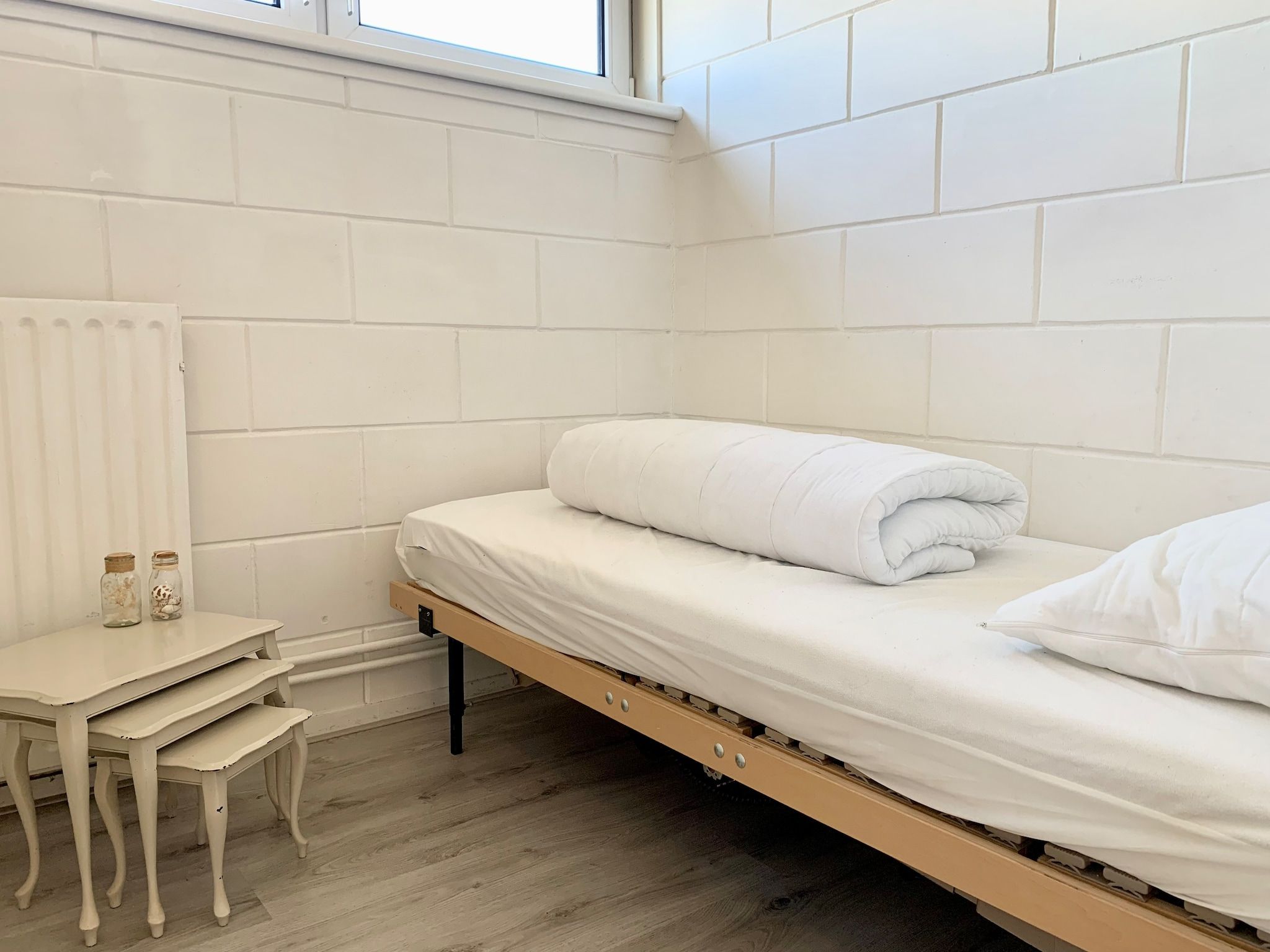 Een slaapkamer van Wildrijk 141 in Sint Maartenszee