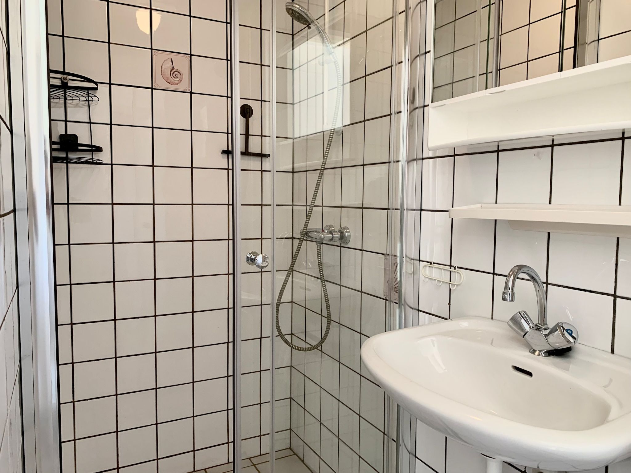 De badkamer van Wildrijk 141 in Sint Maartenszee