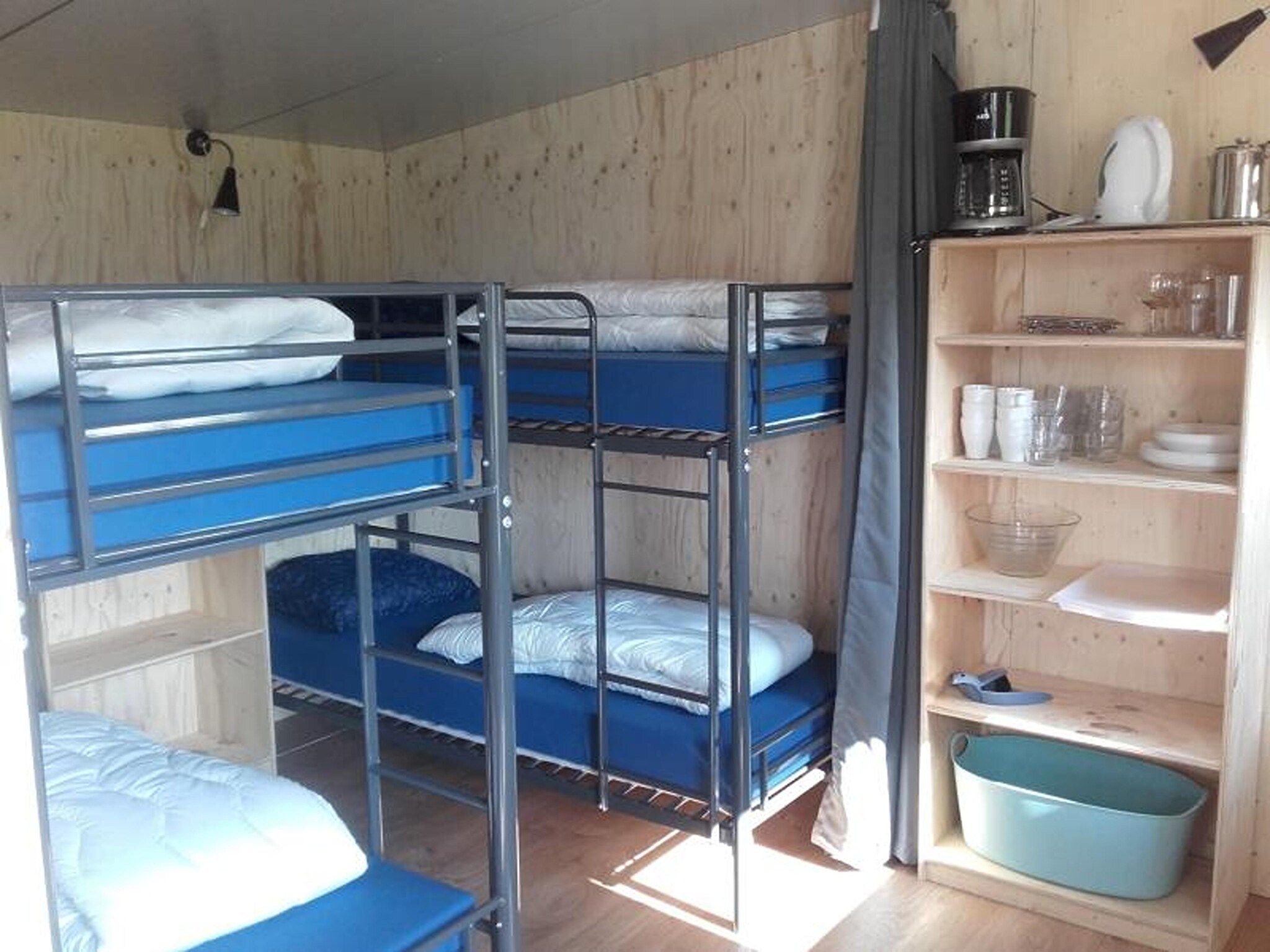 Een slaapkamer van Cosy cabin 2 in Heeg