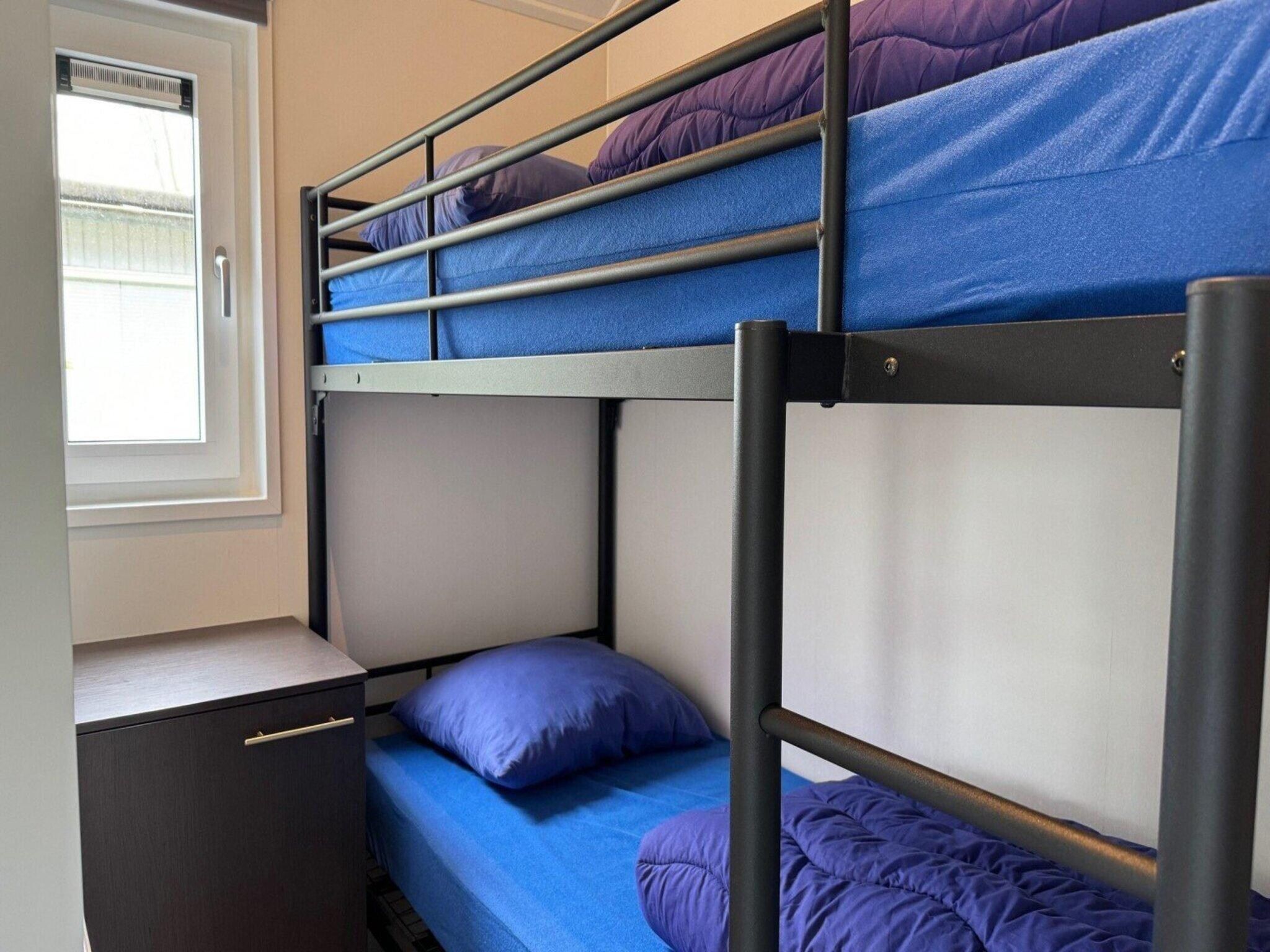 Een slaapkamer van Chalet Egel in Hengelo