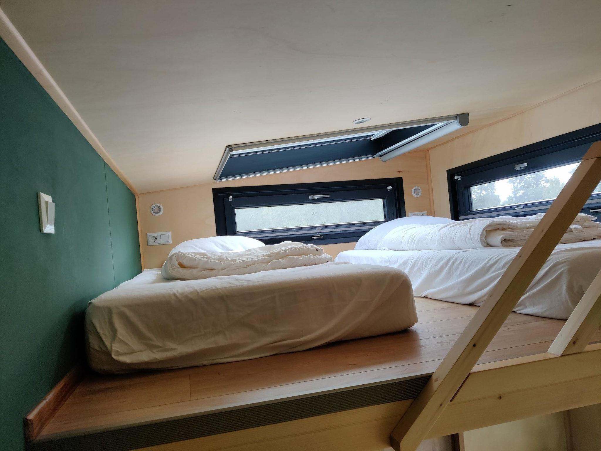 Een slaapkamer van Tiny house voor 2  2 personen in Scherpenzeel (FR)