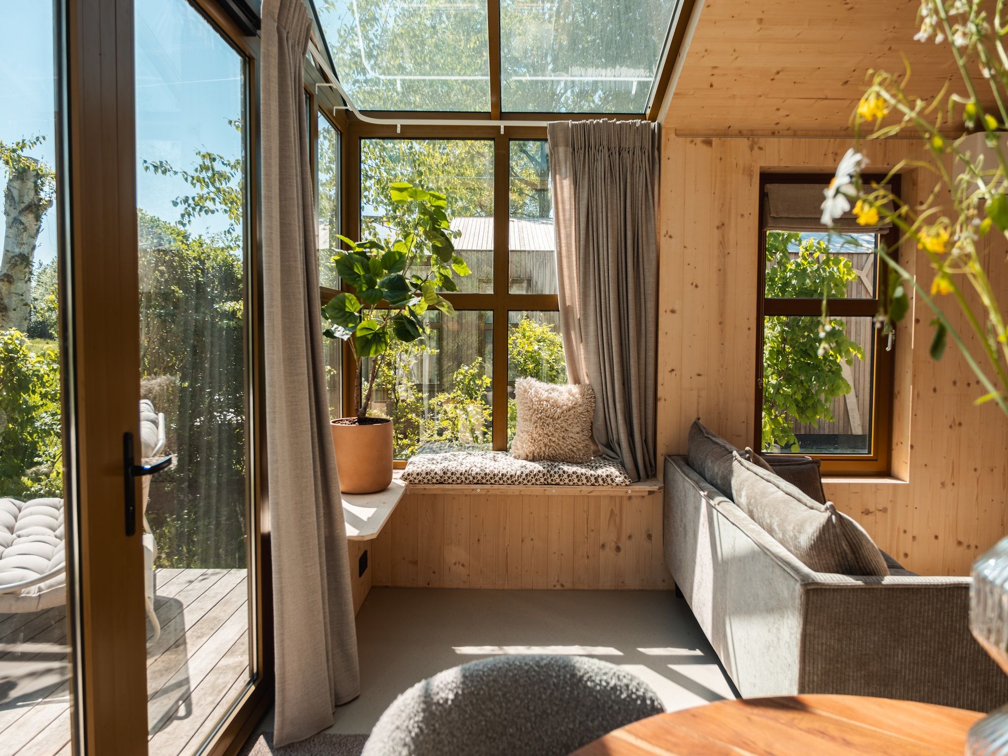 De woonkamer van Large Green House 4 persoons in Scherpenzeel (FR)