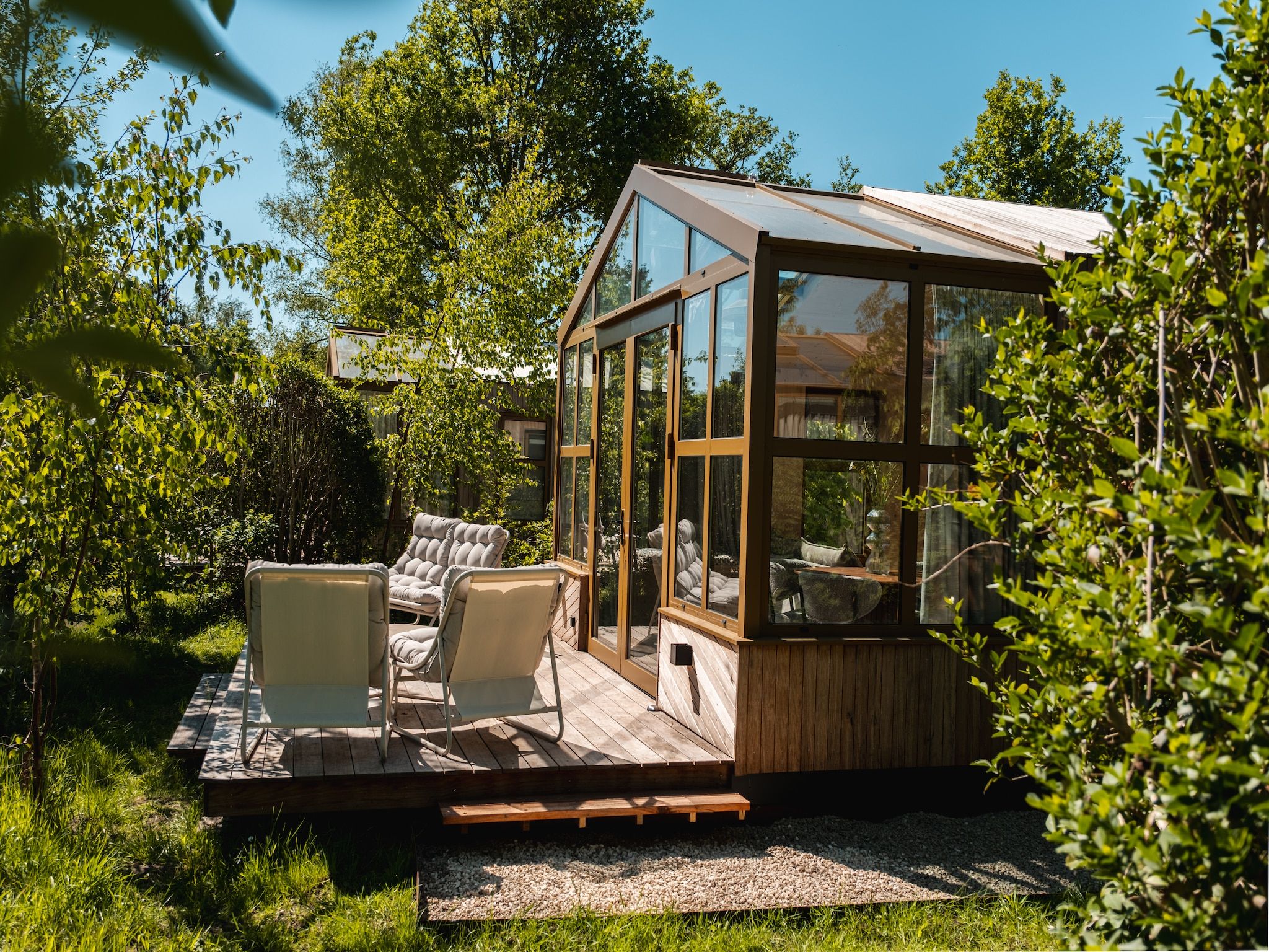 De tuin van Large Green House 4 persoons in Scherpenzeel (FR)