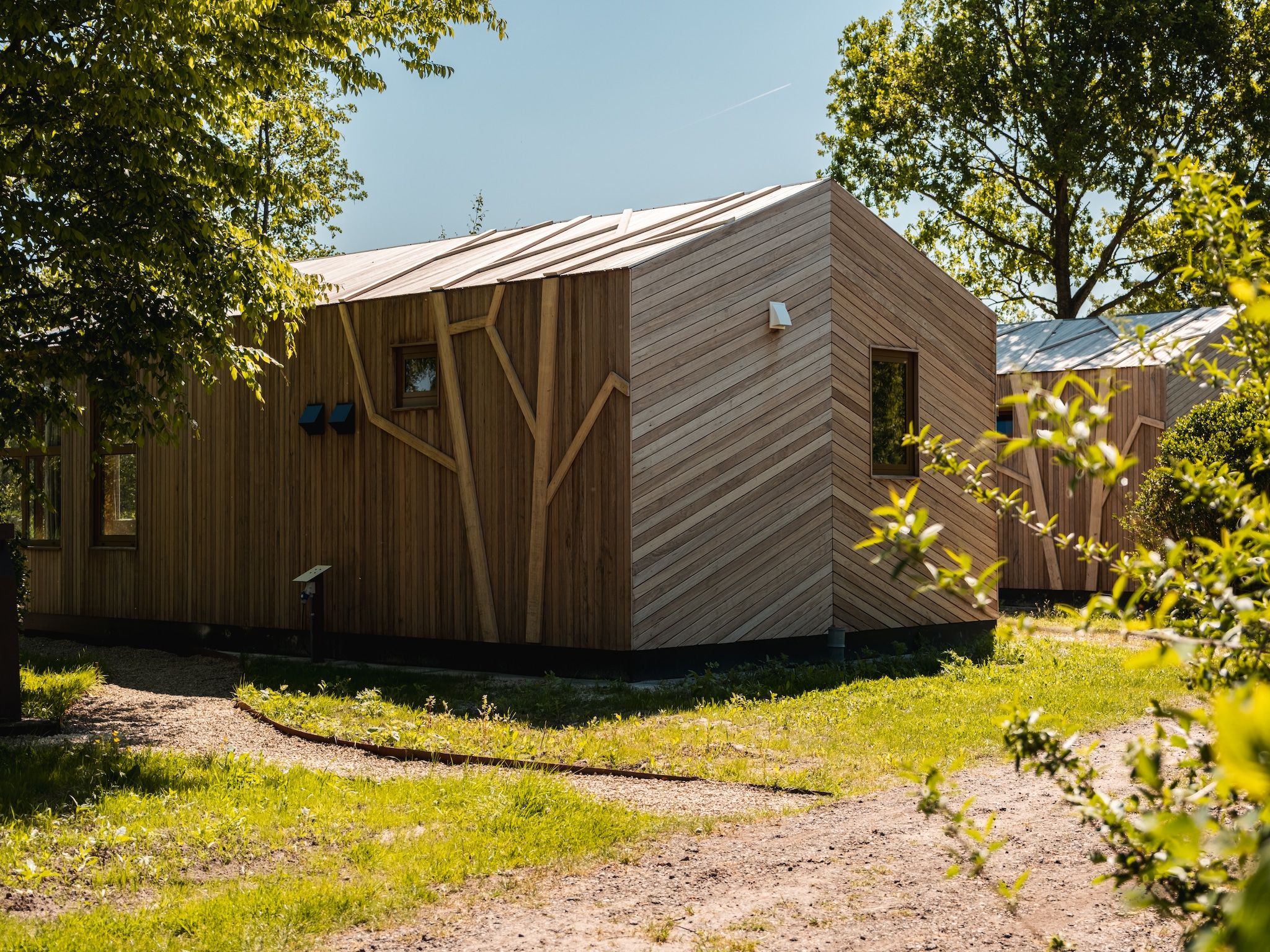 De buitenkant van Large Green House 4 persoons in Scherpenzeel (FR)