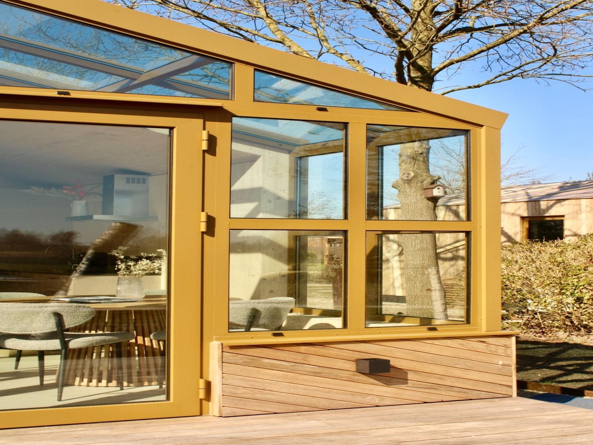 De buitenkant van Groepsaccommodatie + 4 large greenhouses (36 personen) in Scherpenzeel (FR)