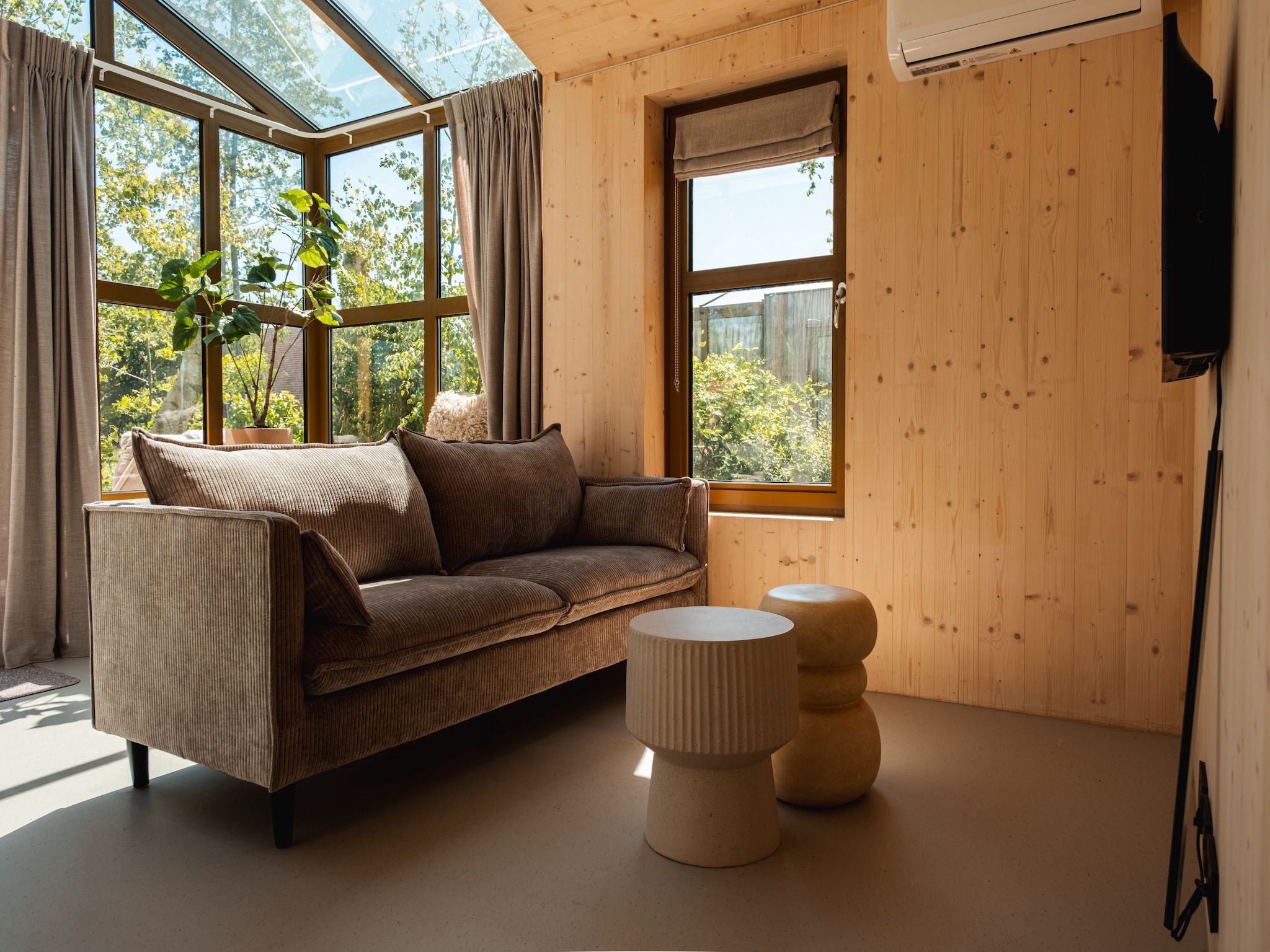 De woonkamer van Groepsruimte i.c.m. 4 large greenhouses in Scherpenzeel (FR)