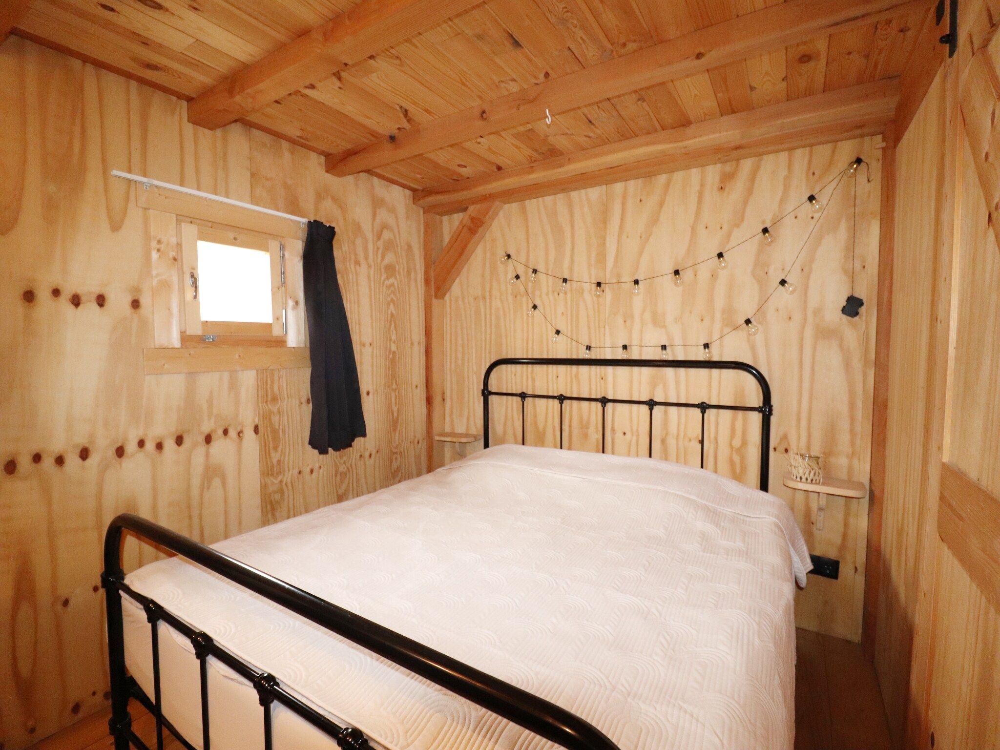 Een slaapkamer van Grutto en Turleluur in Tjerkgaast