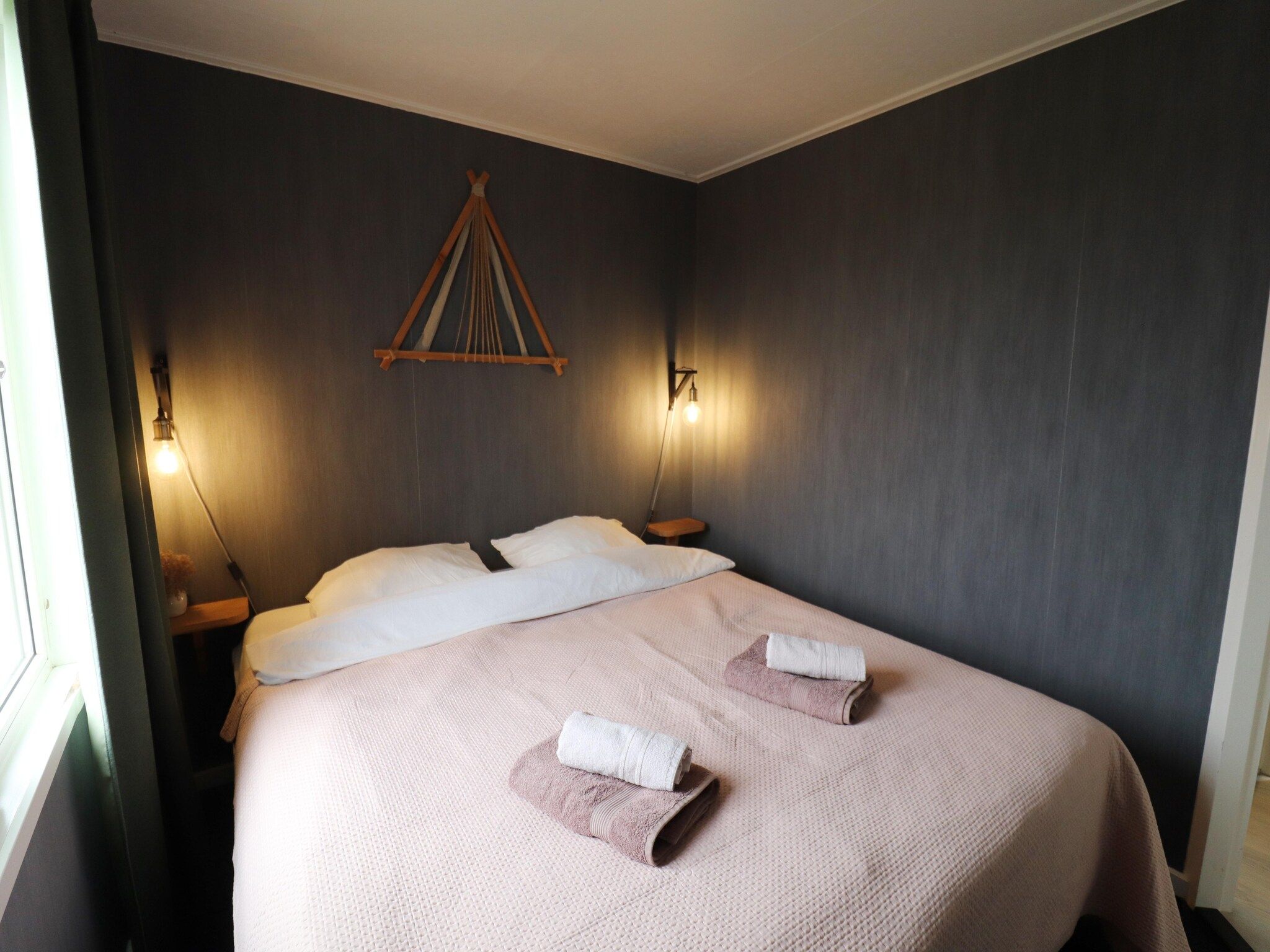 Een slaapkamer van Grutto en Turleluur in Tjerkgaast