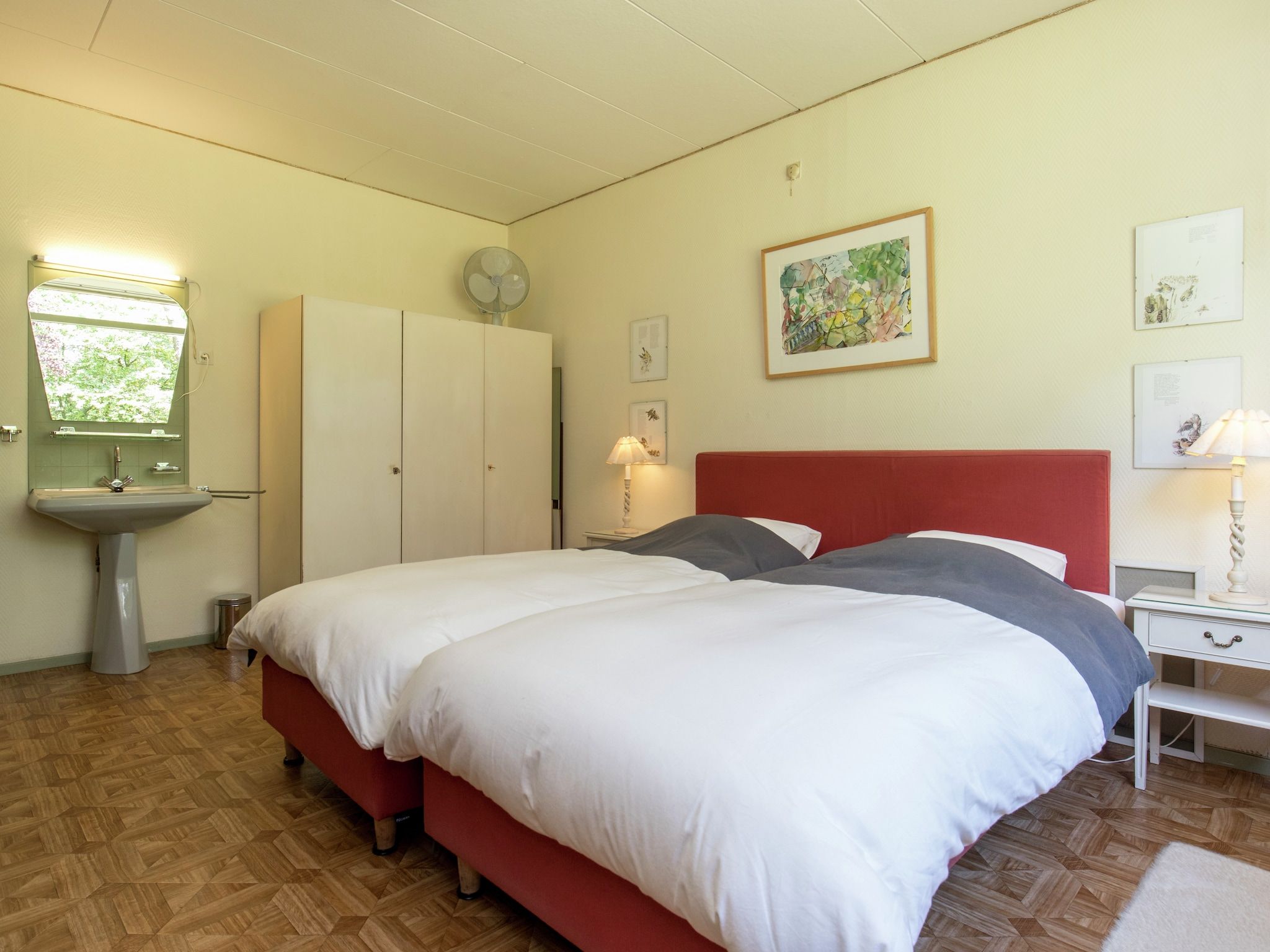 Een slaapkamer van Ruischende Dennen in Huybergen