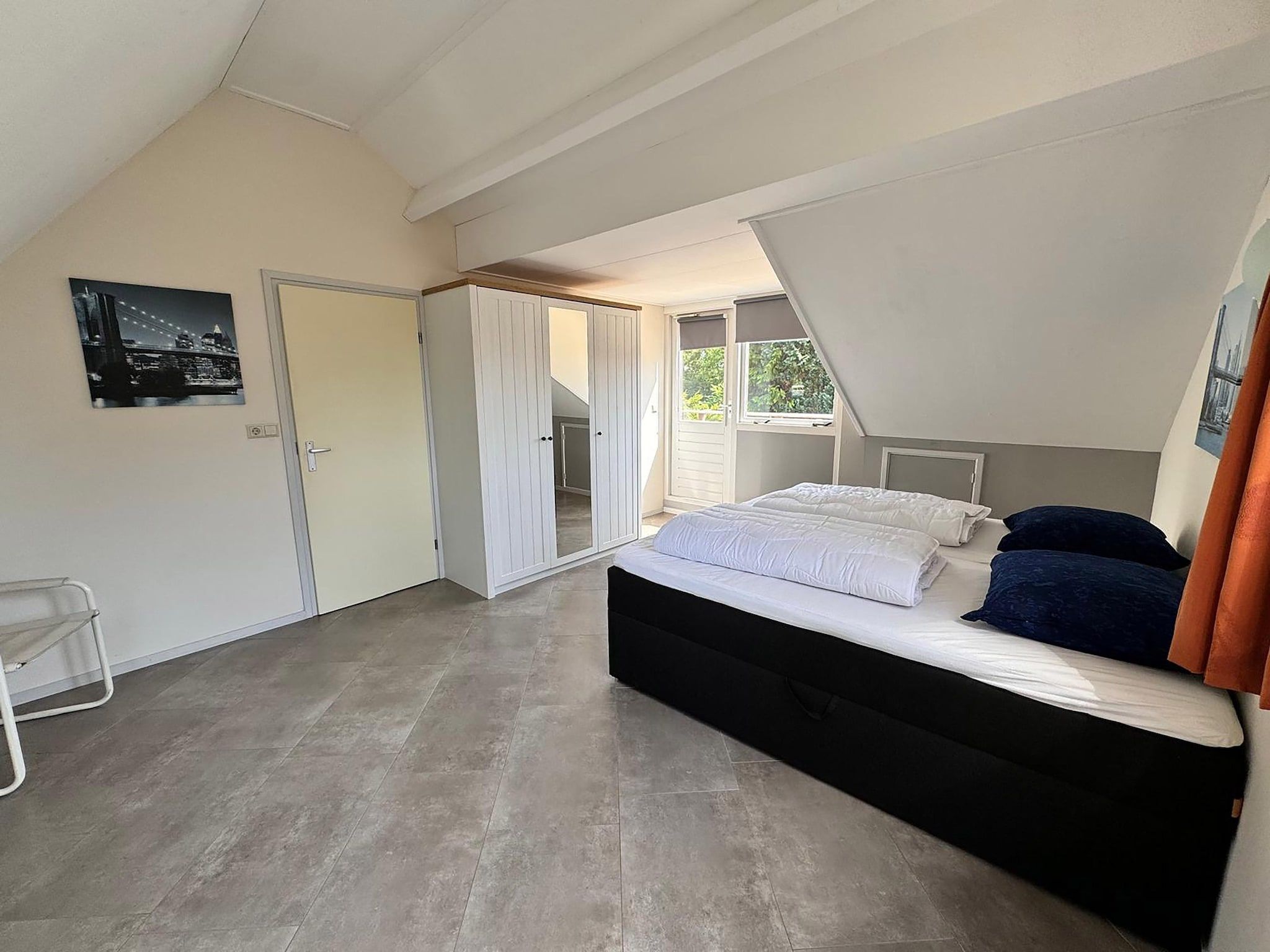 Een slaapkamer van Bungalow 309 in De Koog