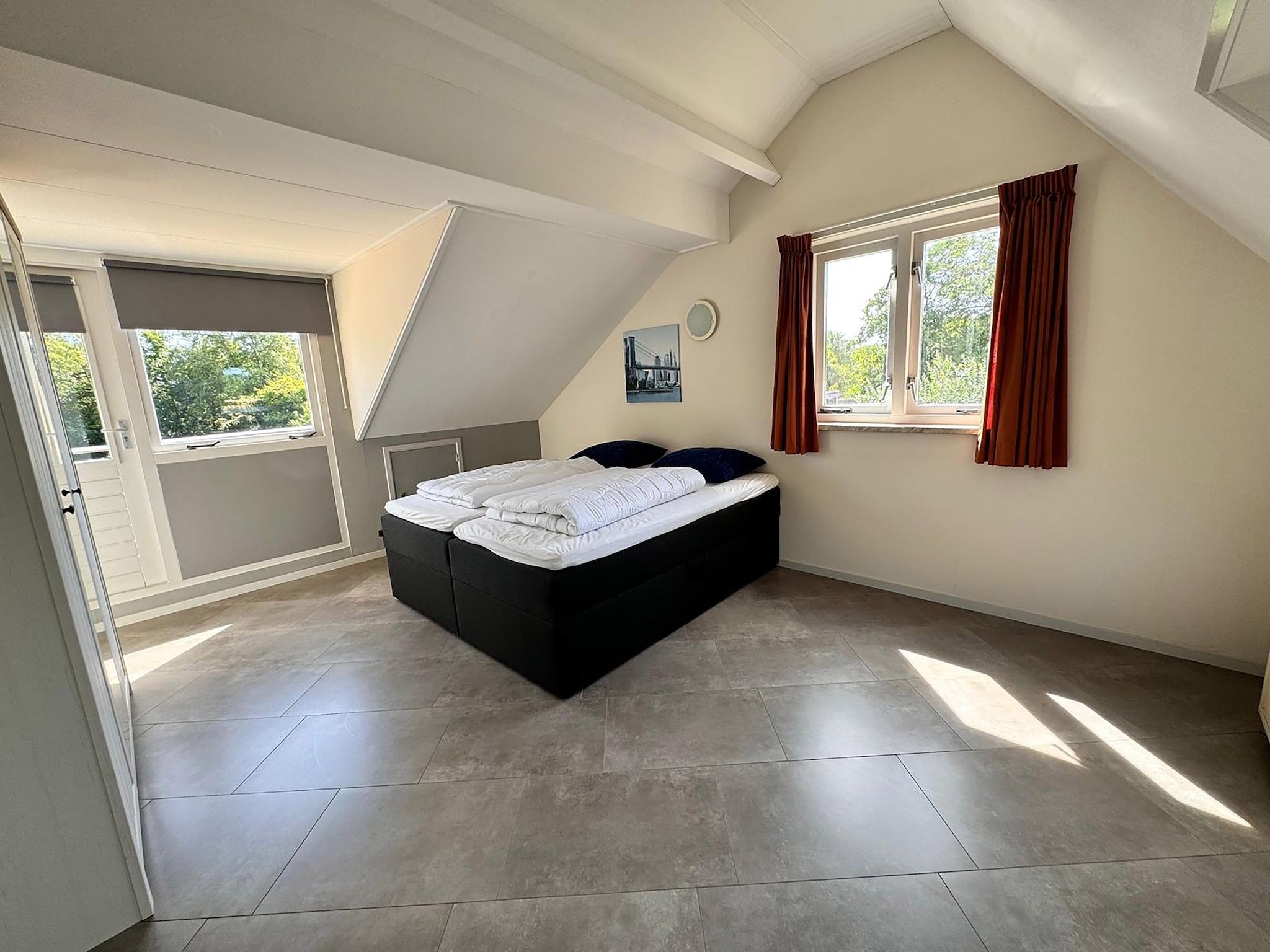 Een slaapkamer van Bungalow 309 in De Koog