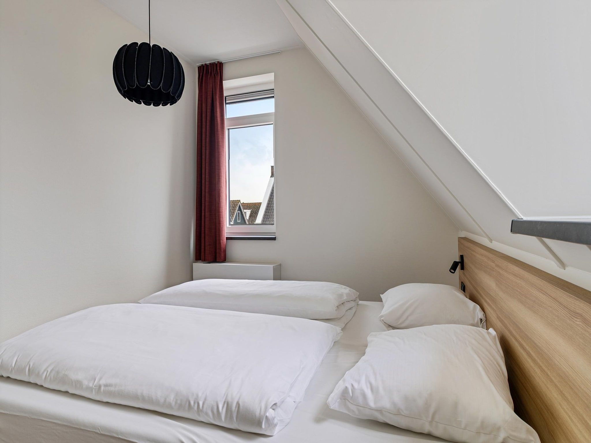 Een slaapkamer van Dijkhuys in PS Opperdoes