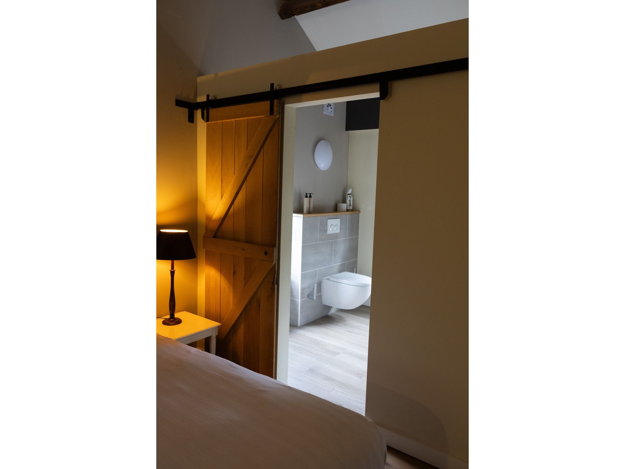 Een slaapkamer van Luxe appartement Nous in Valkenburg