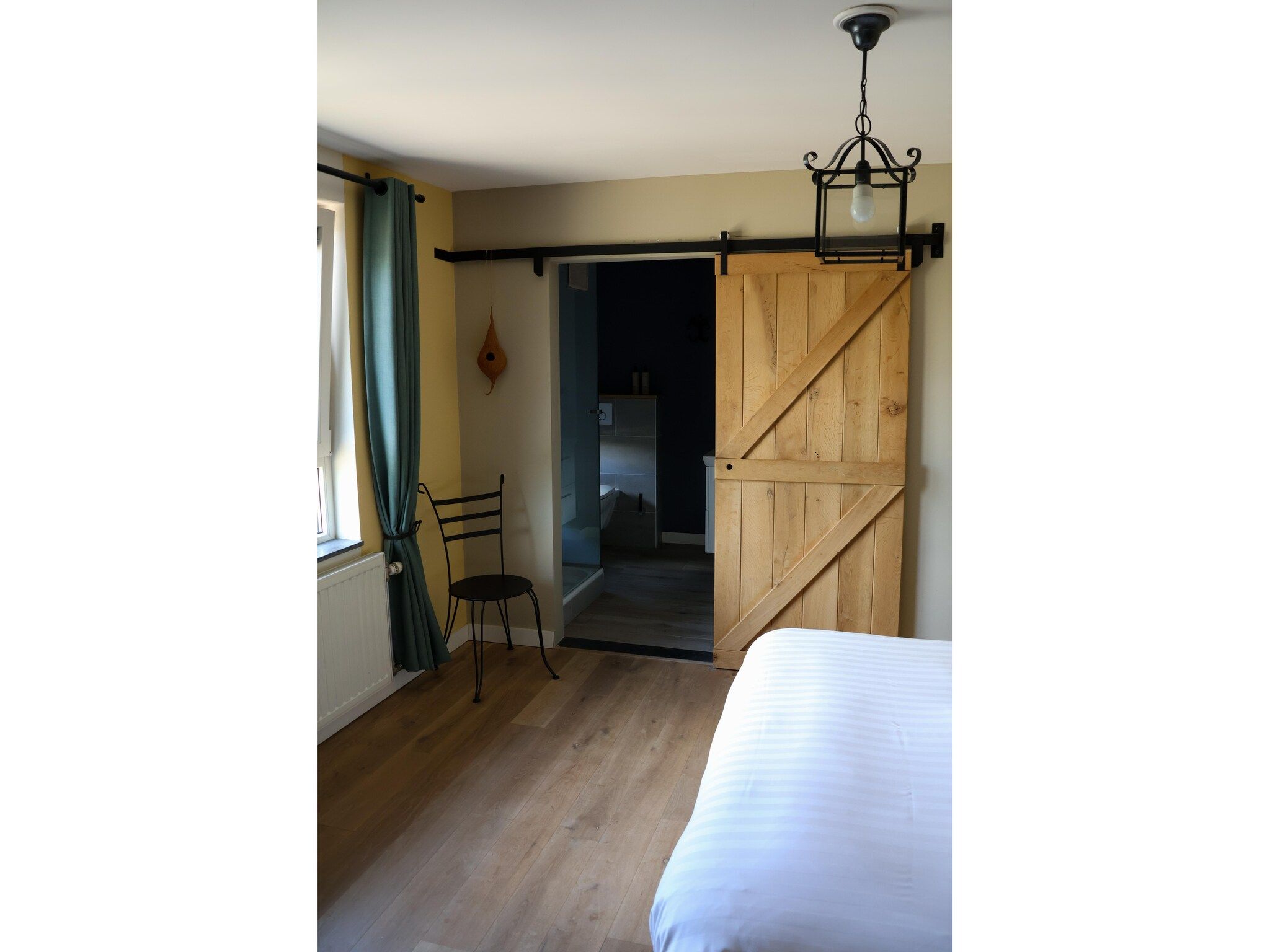 Een slaapkamer van Luxe appartement Nous in Valkenburg