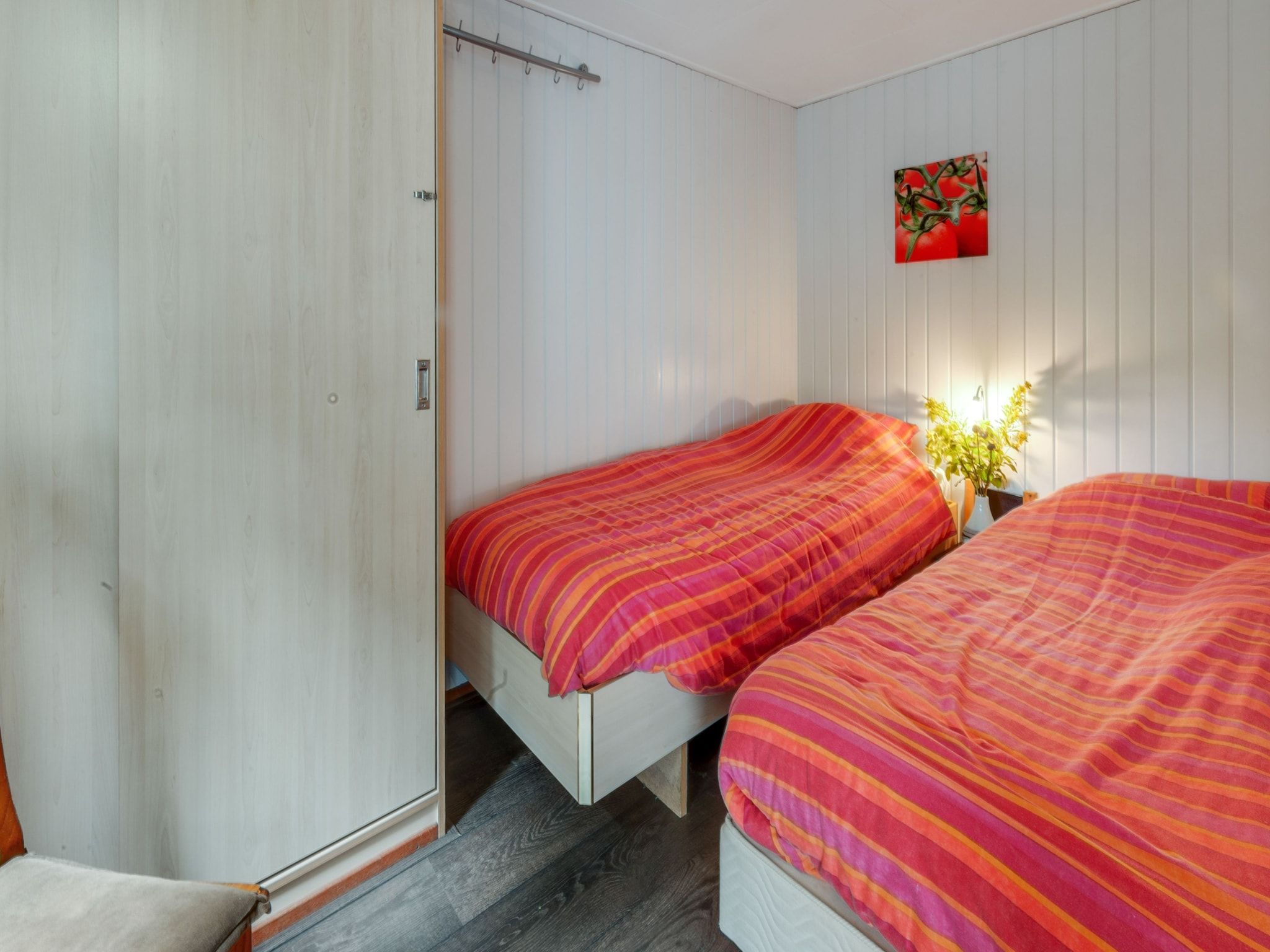 Een slaapkamer van Huisje Arti in Ommen- Stegeren