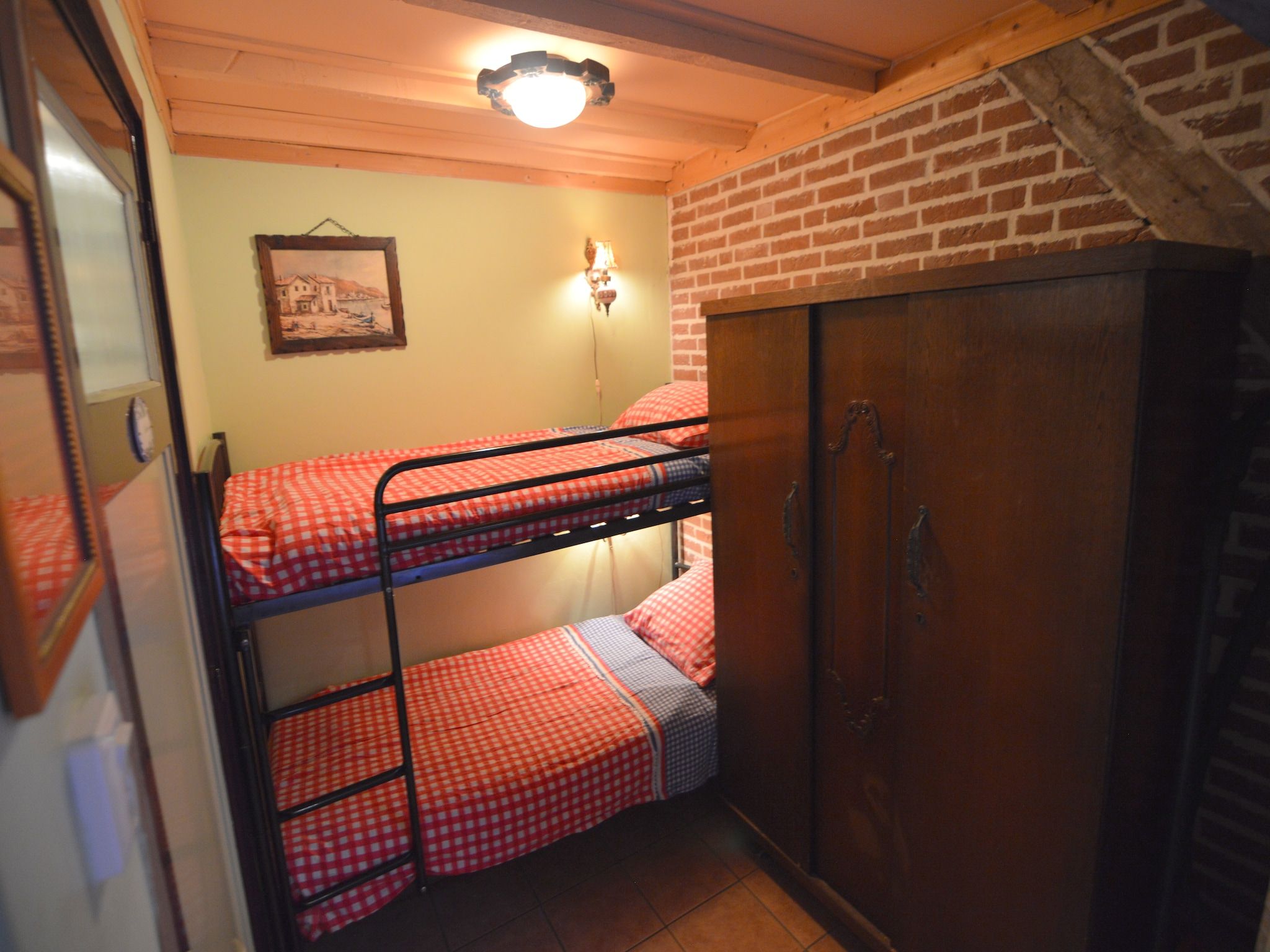 Een slaapkamer van De Herberg in Bergen op Zoom