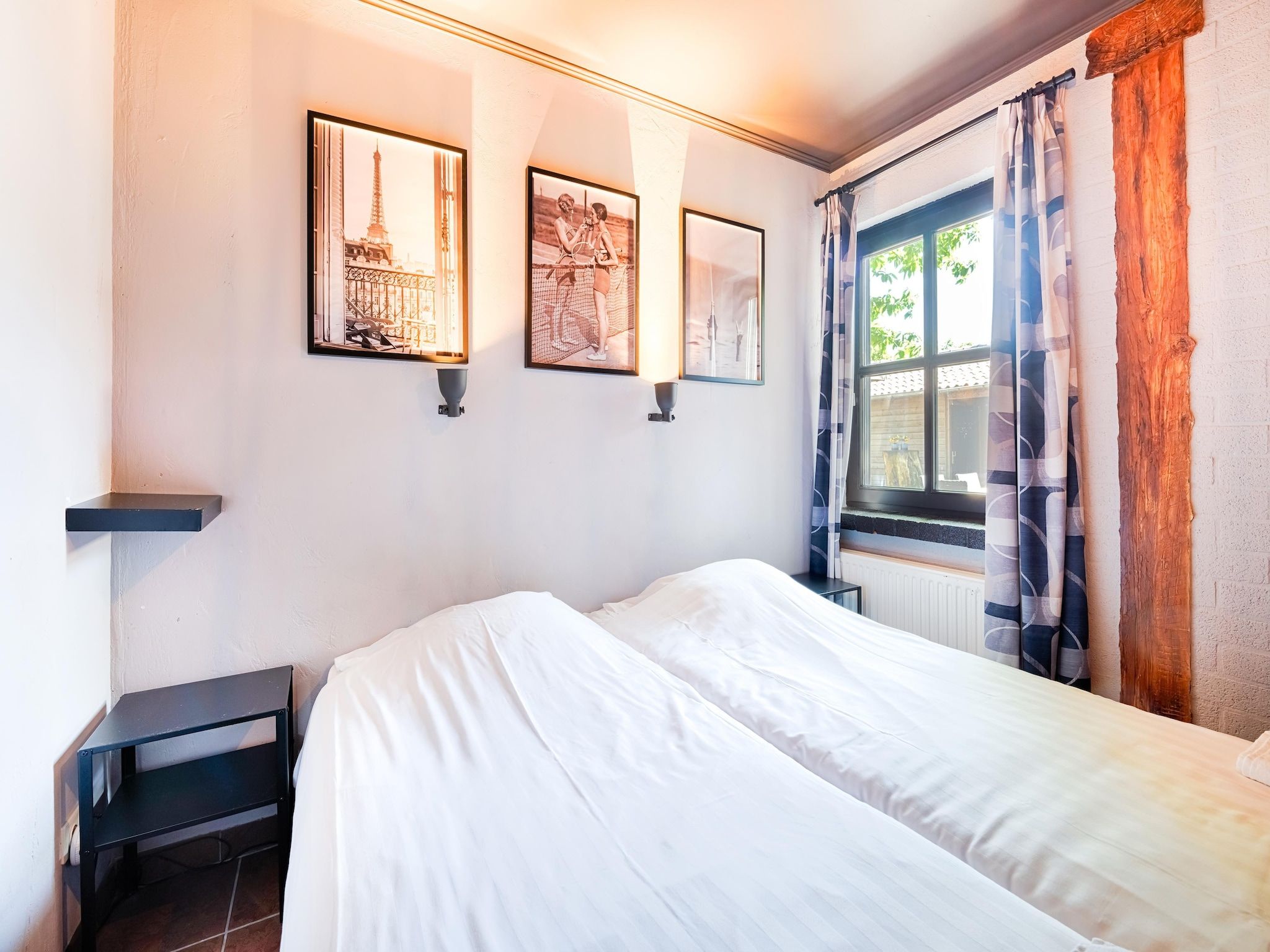 Een slaapkamer van 't Woold in Asten