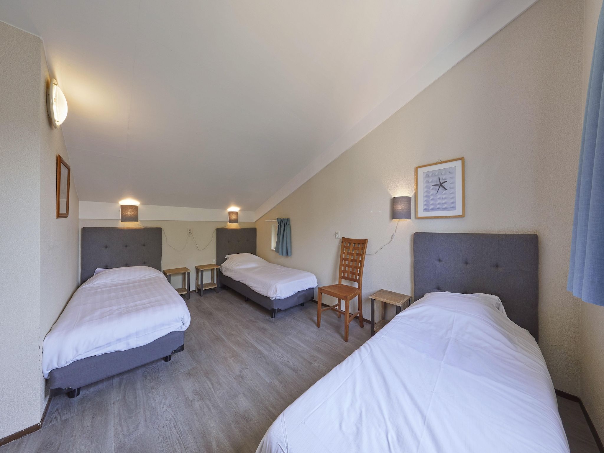 Een slaapkamer van Vakantiepark Kijkduin 6 in Den Haag