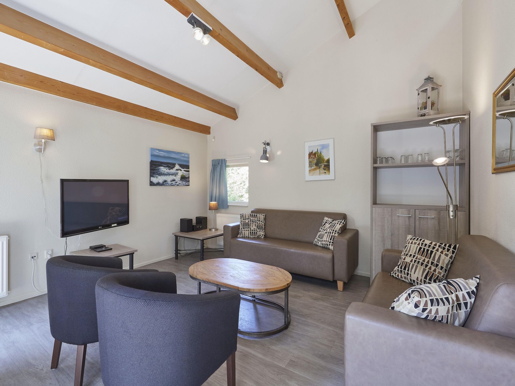 De woonkamer van Vakantiepark Kijkduin 6 in Den Haag