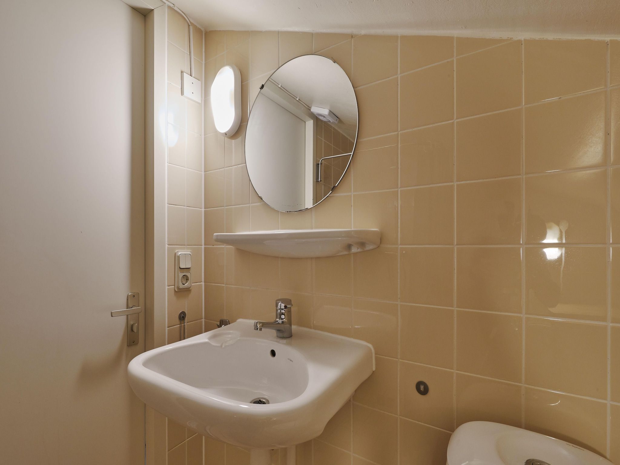 De badkamer van Vakantiepark Kijkduin 6 in Den Haag